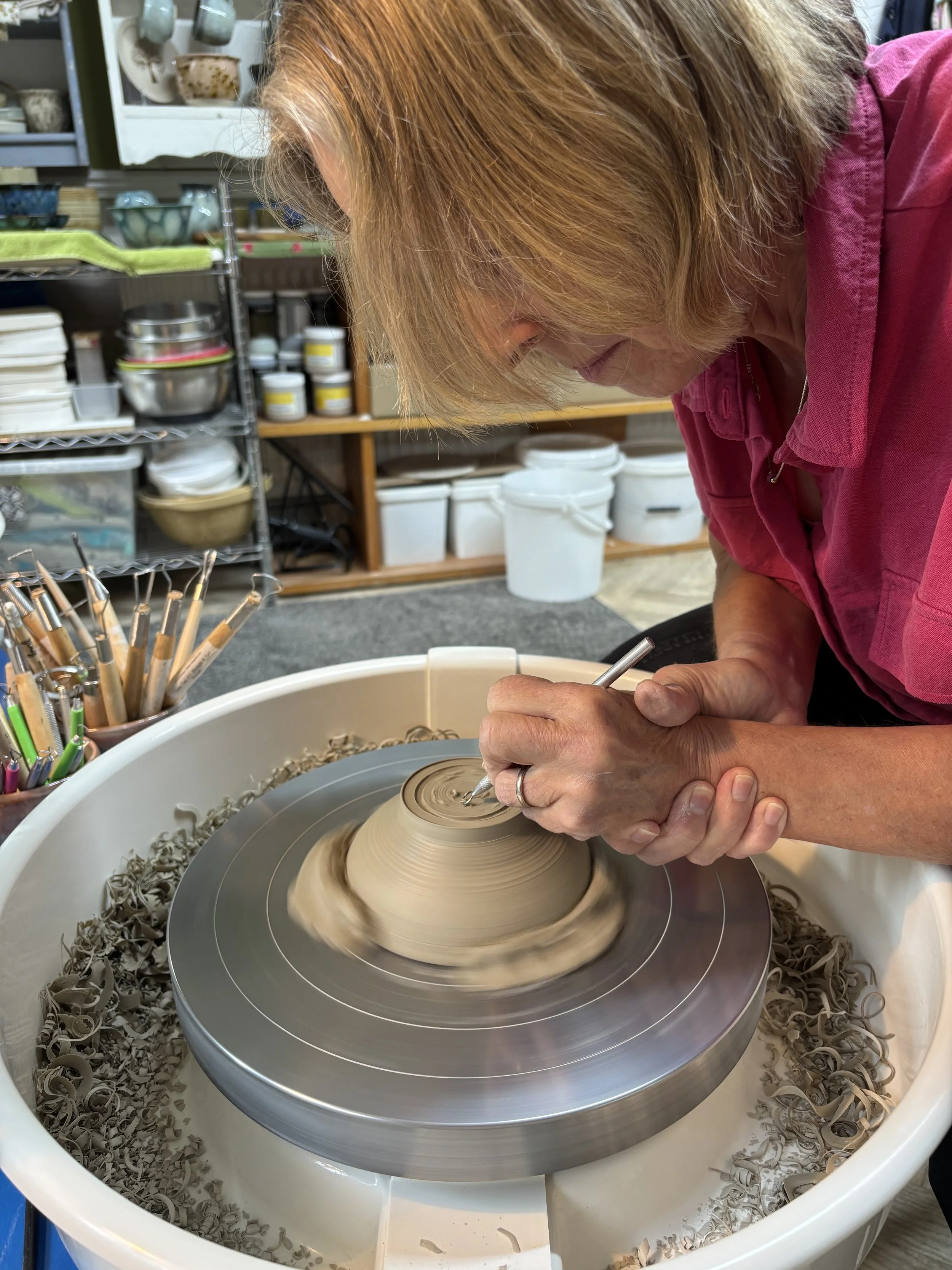   
 Elizabeth has been learning how to trim her leather-hard pieces!  
 