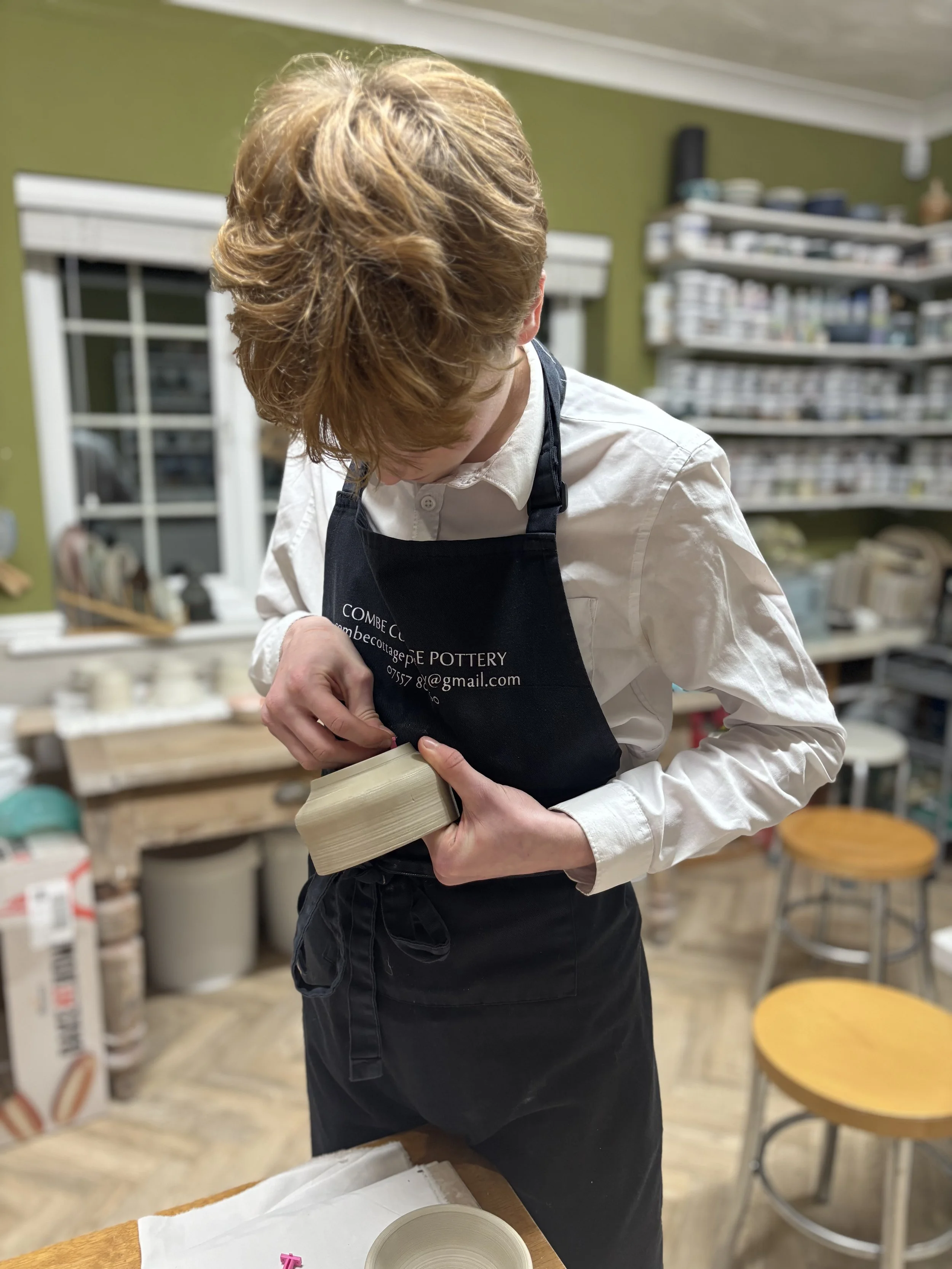   
 Finn has been trimming his pieces and choosing his glazing for his final session!  
 