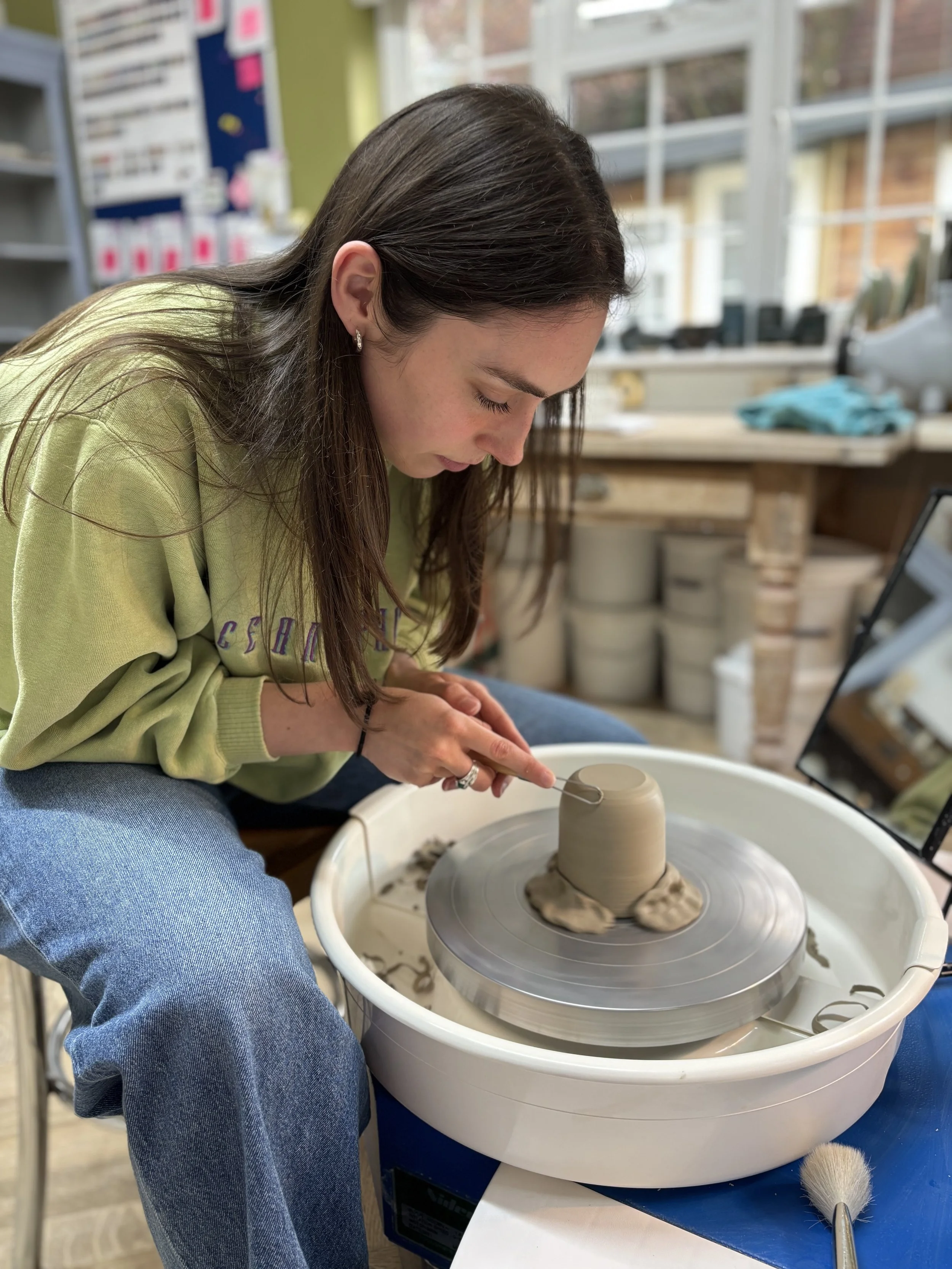   
  Erin has been trimming her final pieces & choosing her glazes for the last session of her 5 week course! 
 