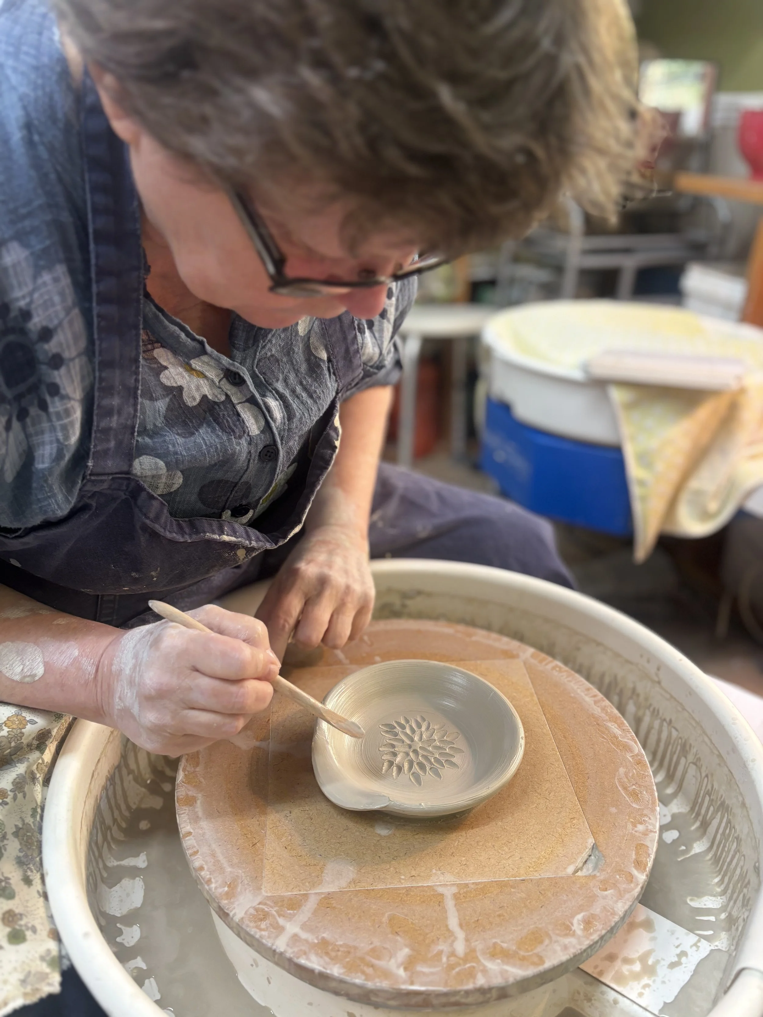   
  Bernie has been throwing spoon rests as well as her first plate & larger bowl! 
 