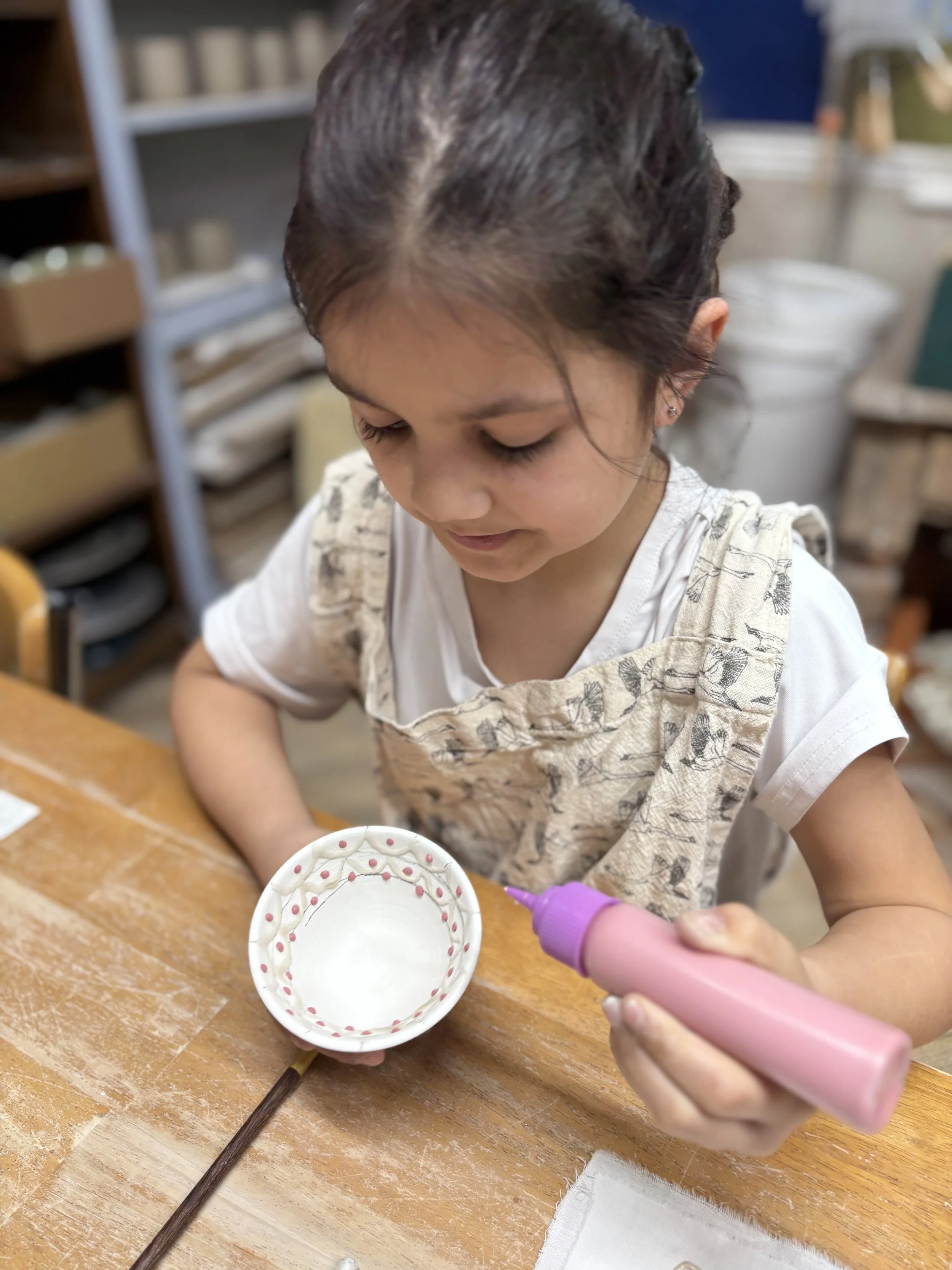   
 Ava has been doing her final trimming & started to glaze her pieces! 
 