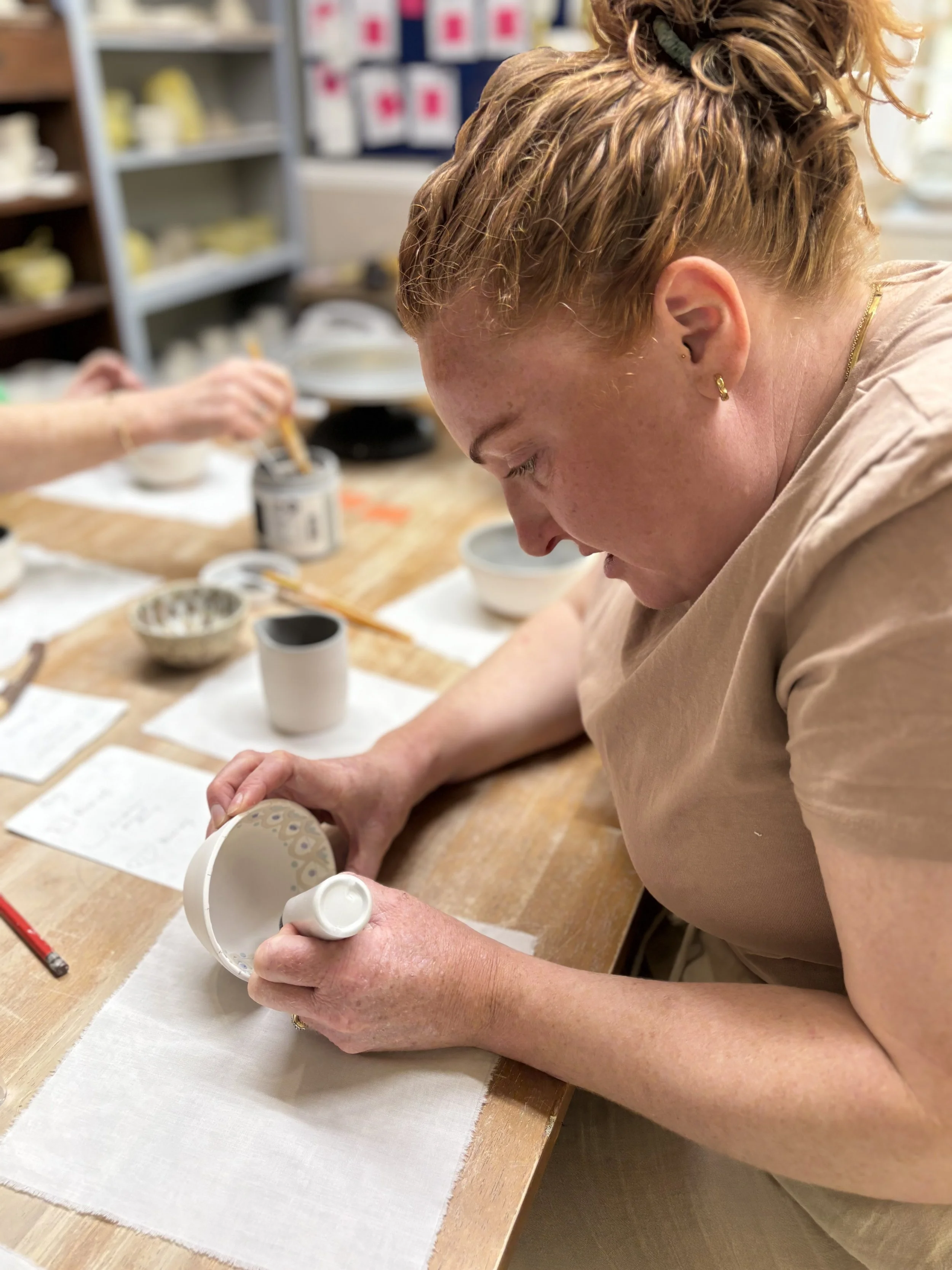 Emily has been glazing her pieces...