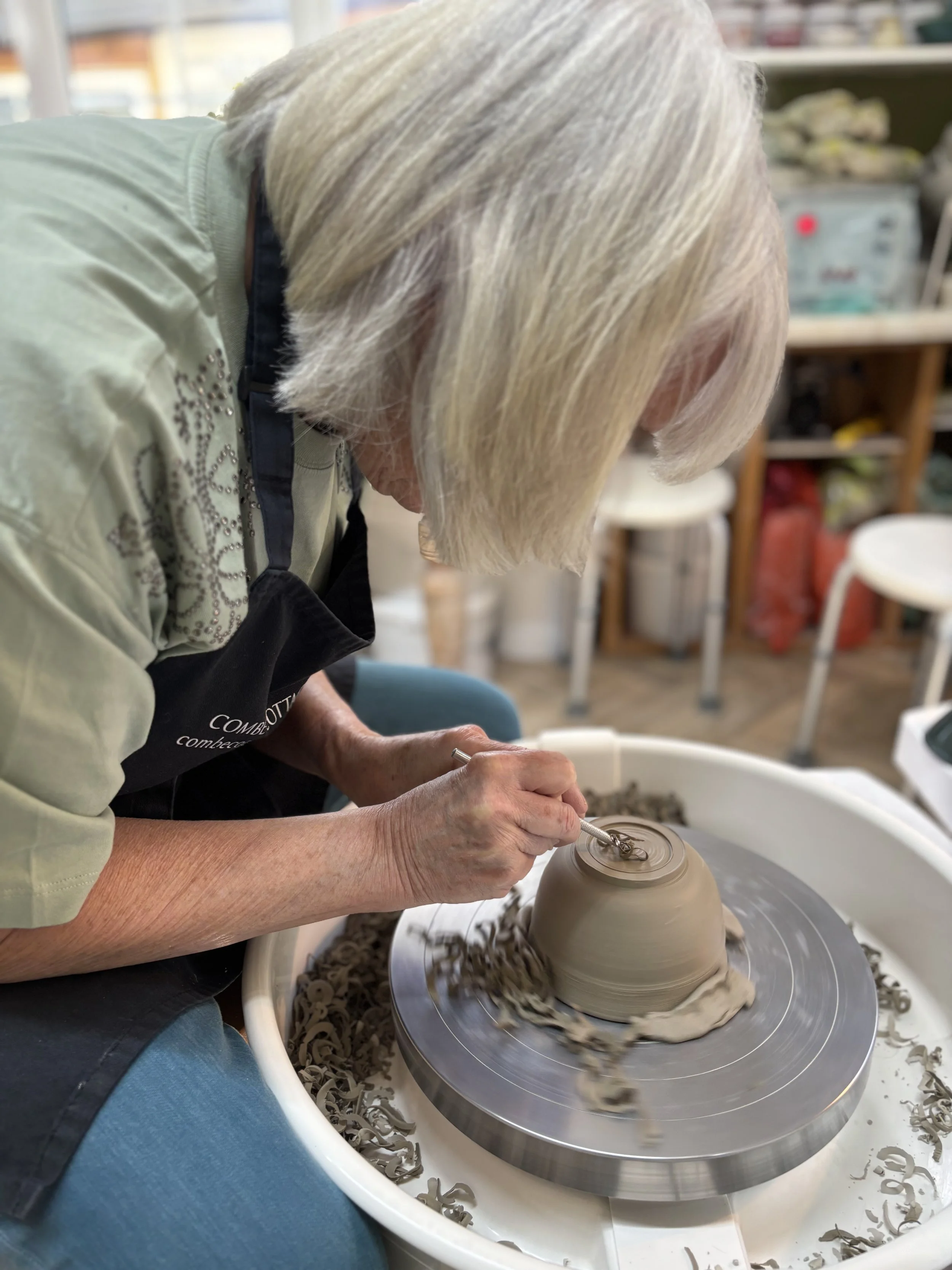   
  Christine has been trimming her pieces thrown last week on her 5 week course! 
 