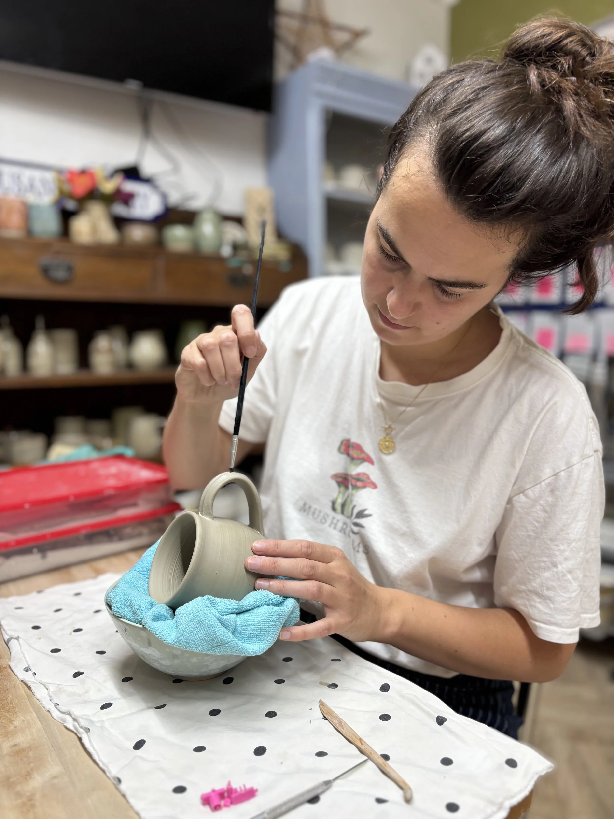   
 Lizzie has been adding her handles to her latest set of mugs! 
 