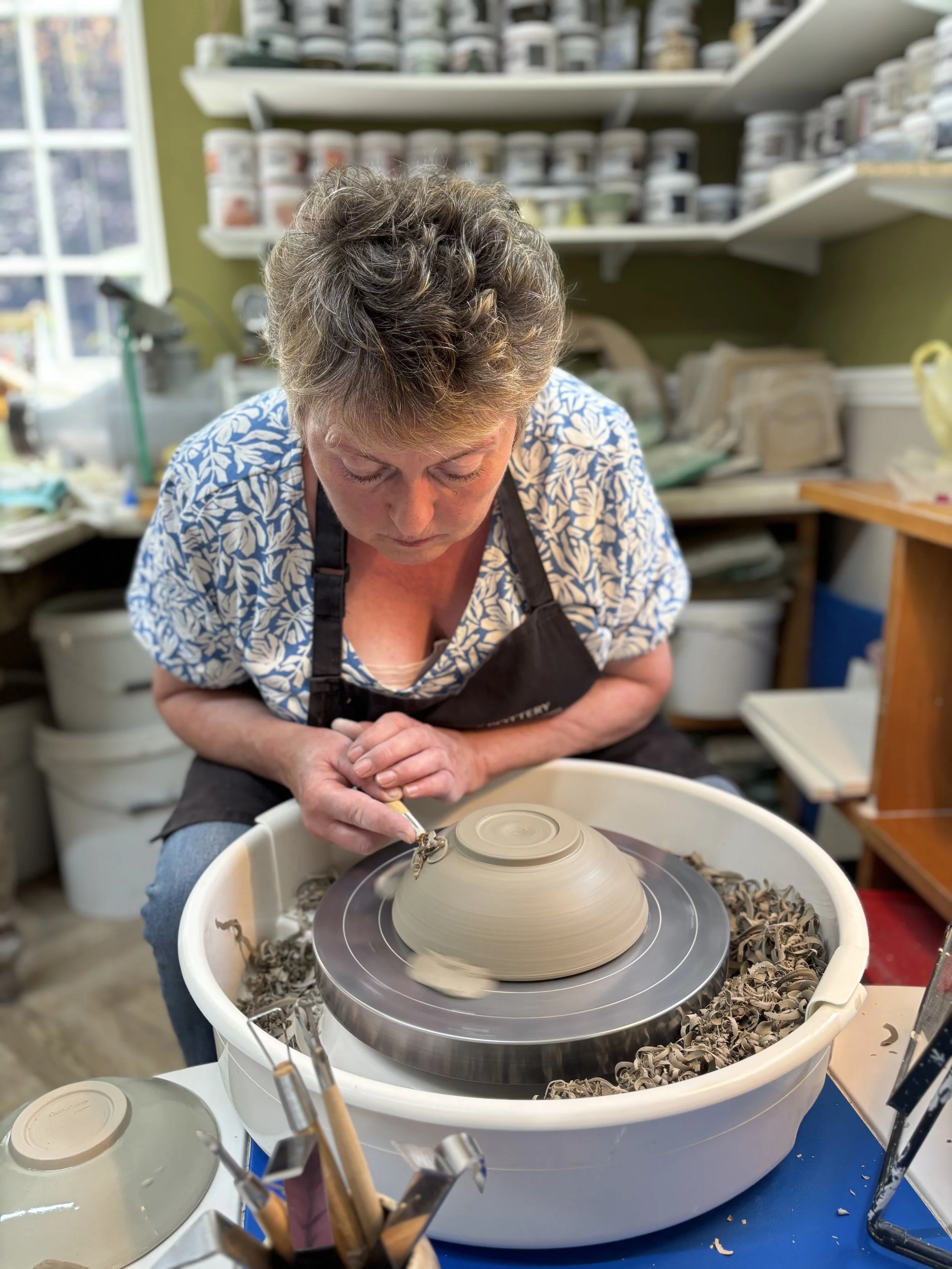 Julia has been trimming her bowls ready to decorate using the sgraffito technique ...
