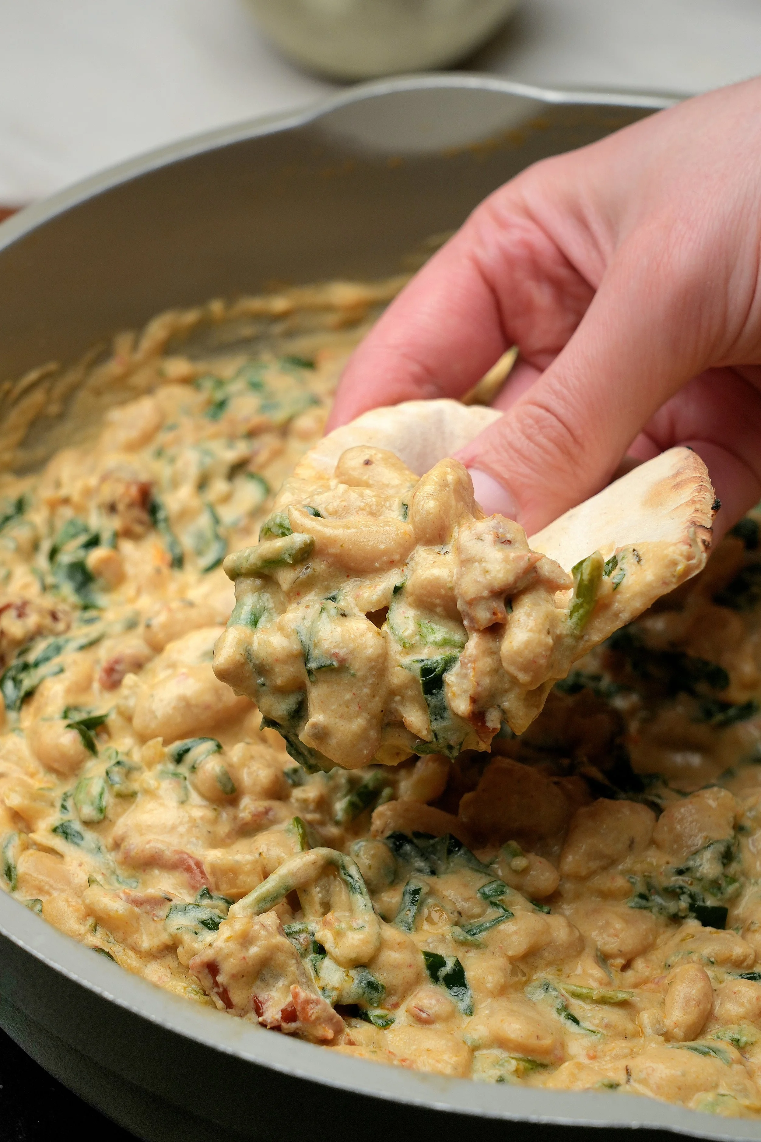 high protein meal prep creamy batch cook sundried tomato spinach and basil cannellini beans vegan gluten free image