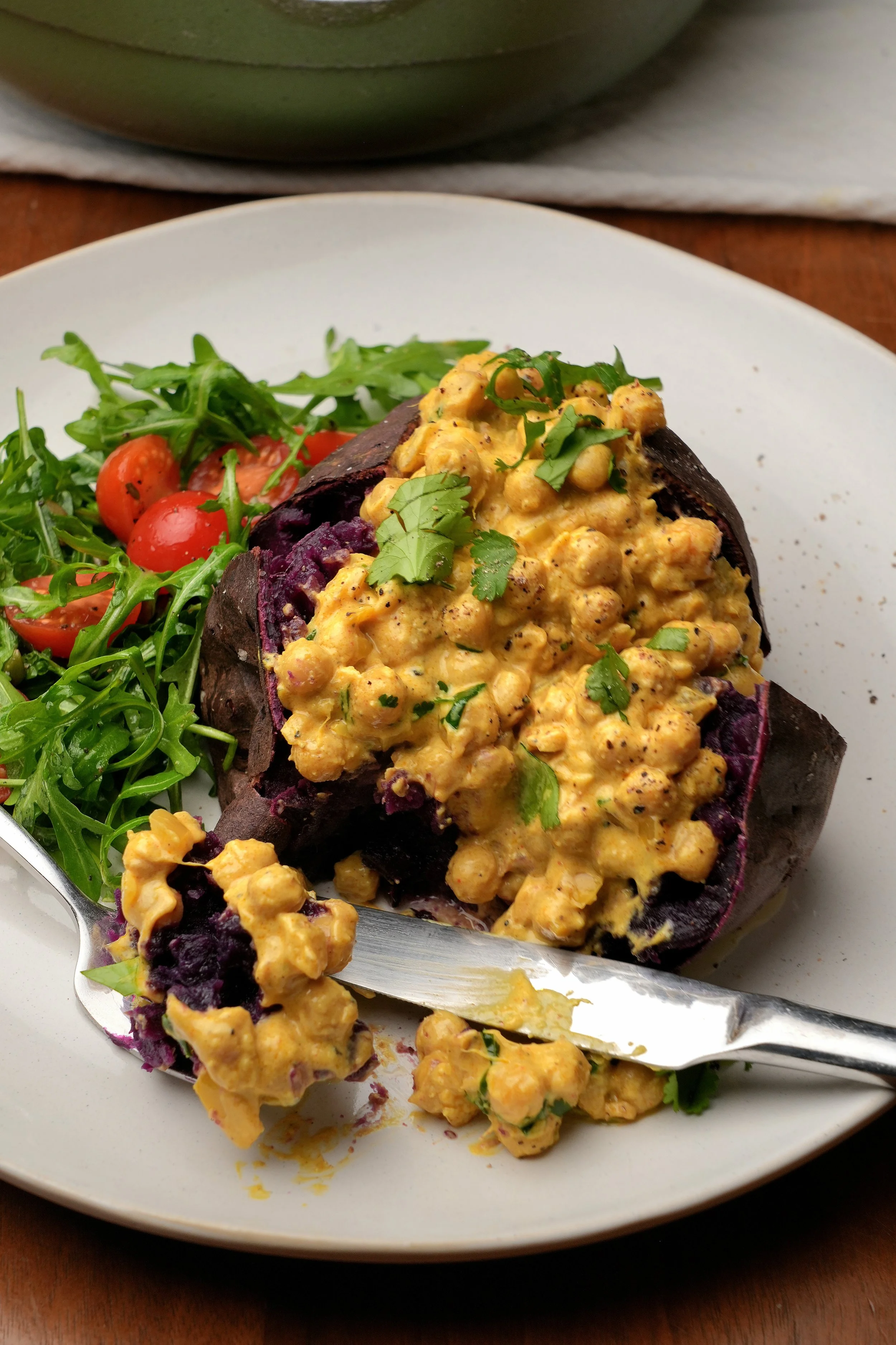close up image of creamy high protein golden anti inflammatory chickpeas meal prep batch cook high plant protein high fibre turmeric ginger with purple sweet potato