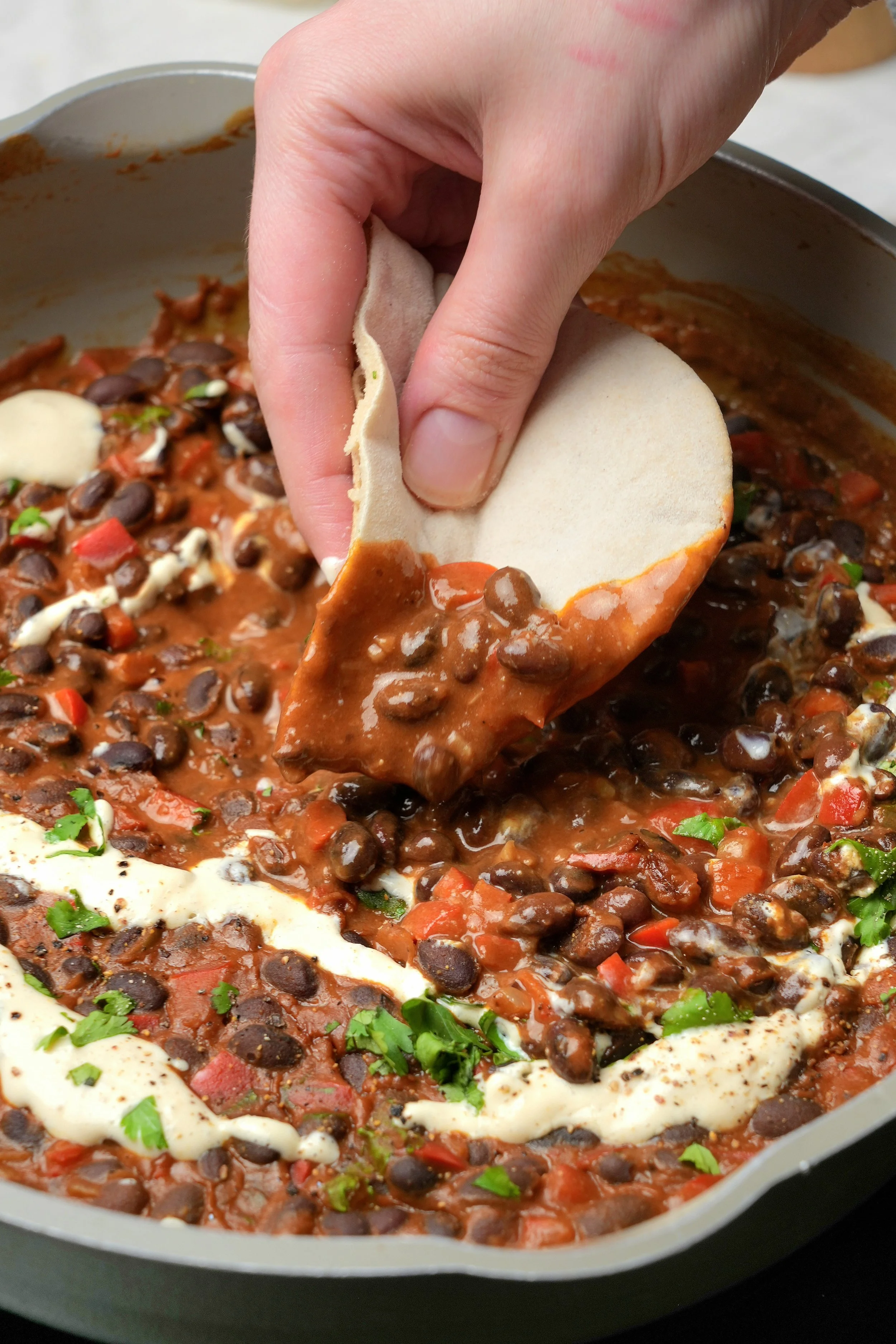 image of creamy high protein peanut butter black beans with silken tofu cream vegan plant based high fibre meal prep batch cook friendly