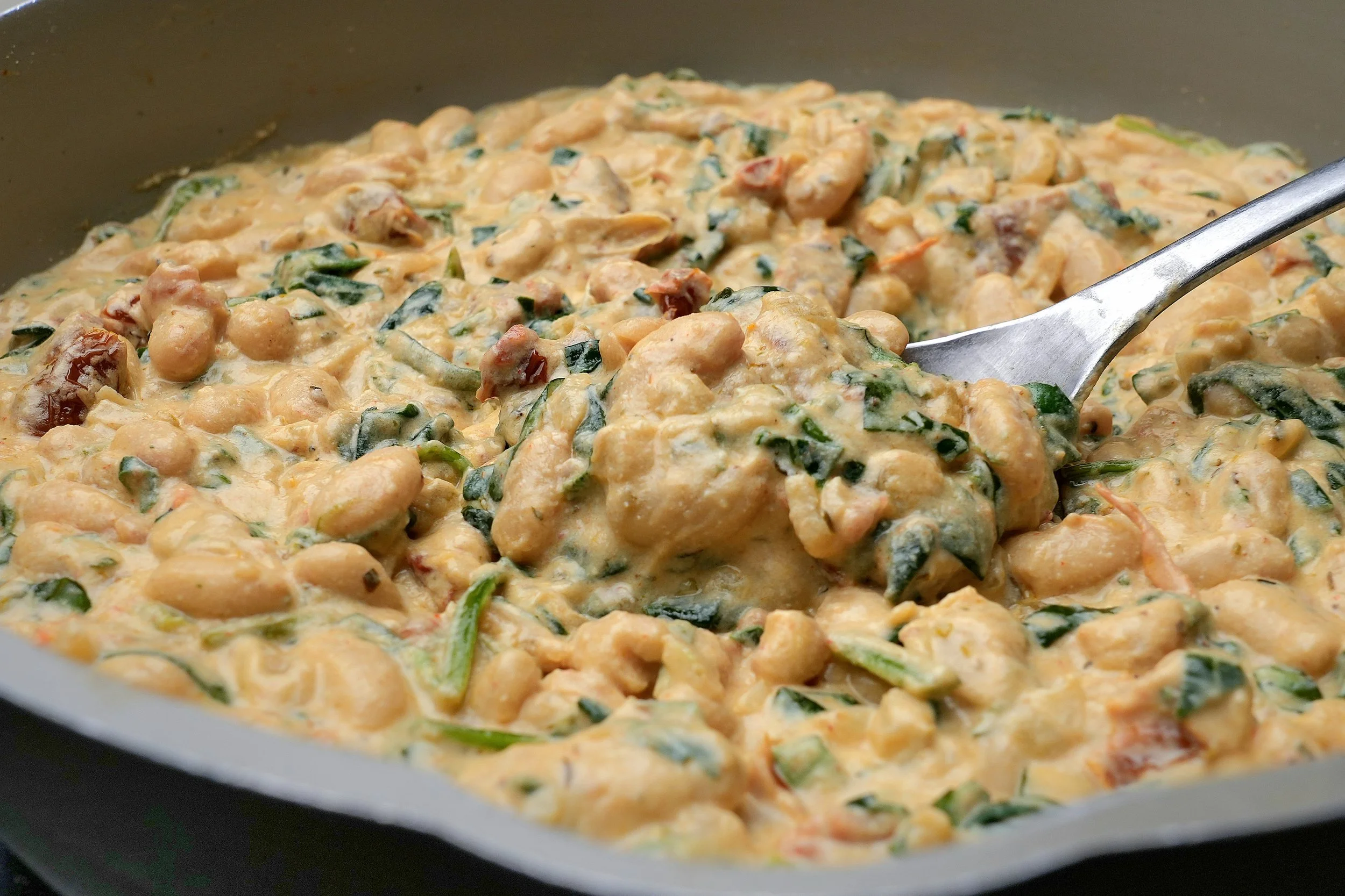high protein meal prep creamy batch cook sundried tomato spinach and basil cannellini beans vegan gluten free image