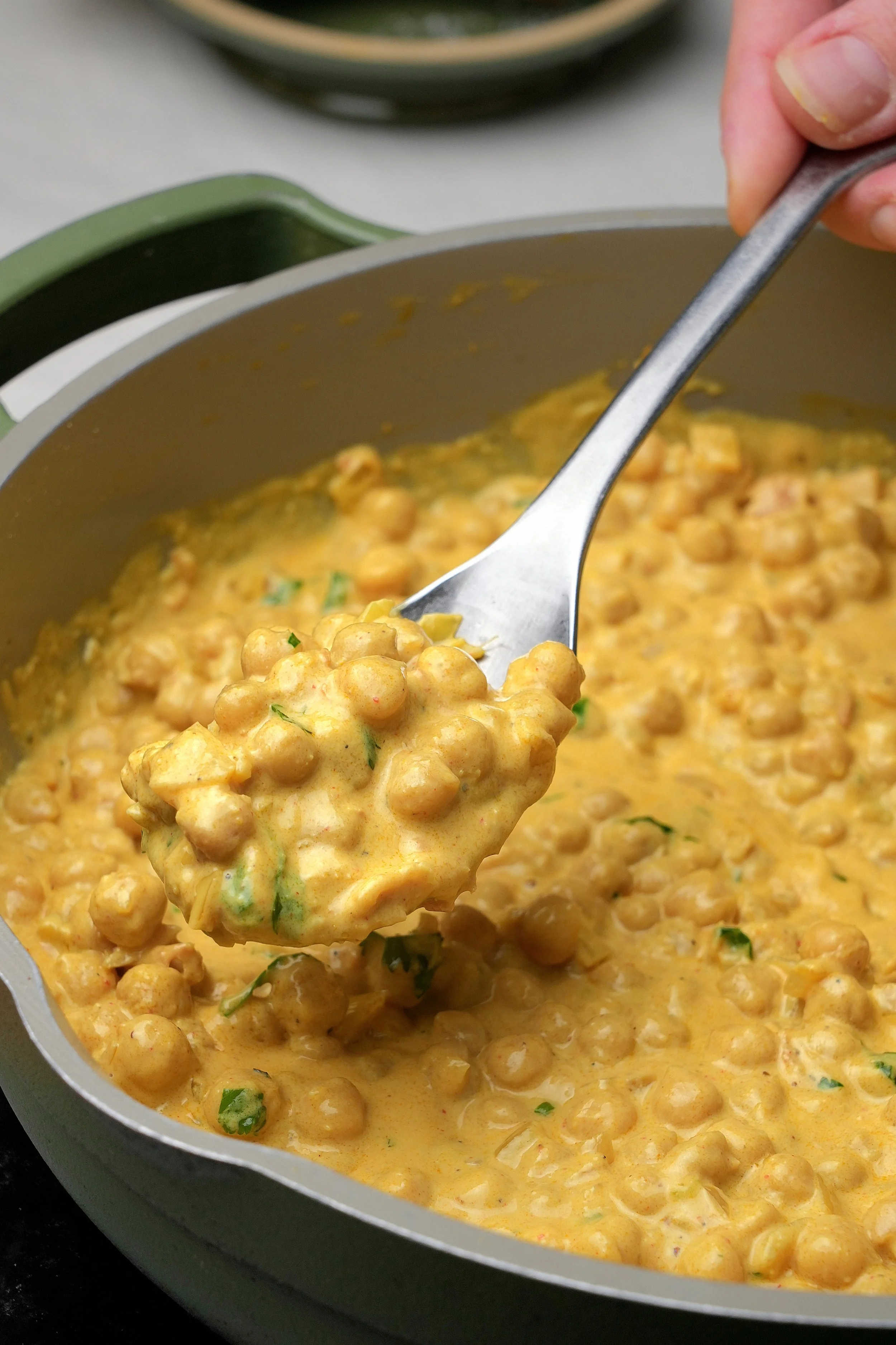 close up image of creamy high protein golden anti inflammatory chickpeas meal prep batch cook high plant protein high fibre turmeric ginger