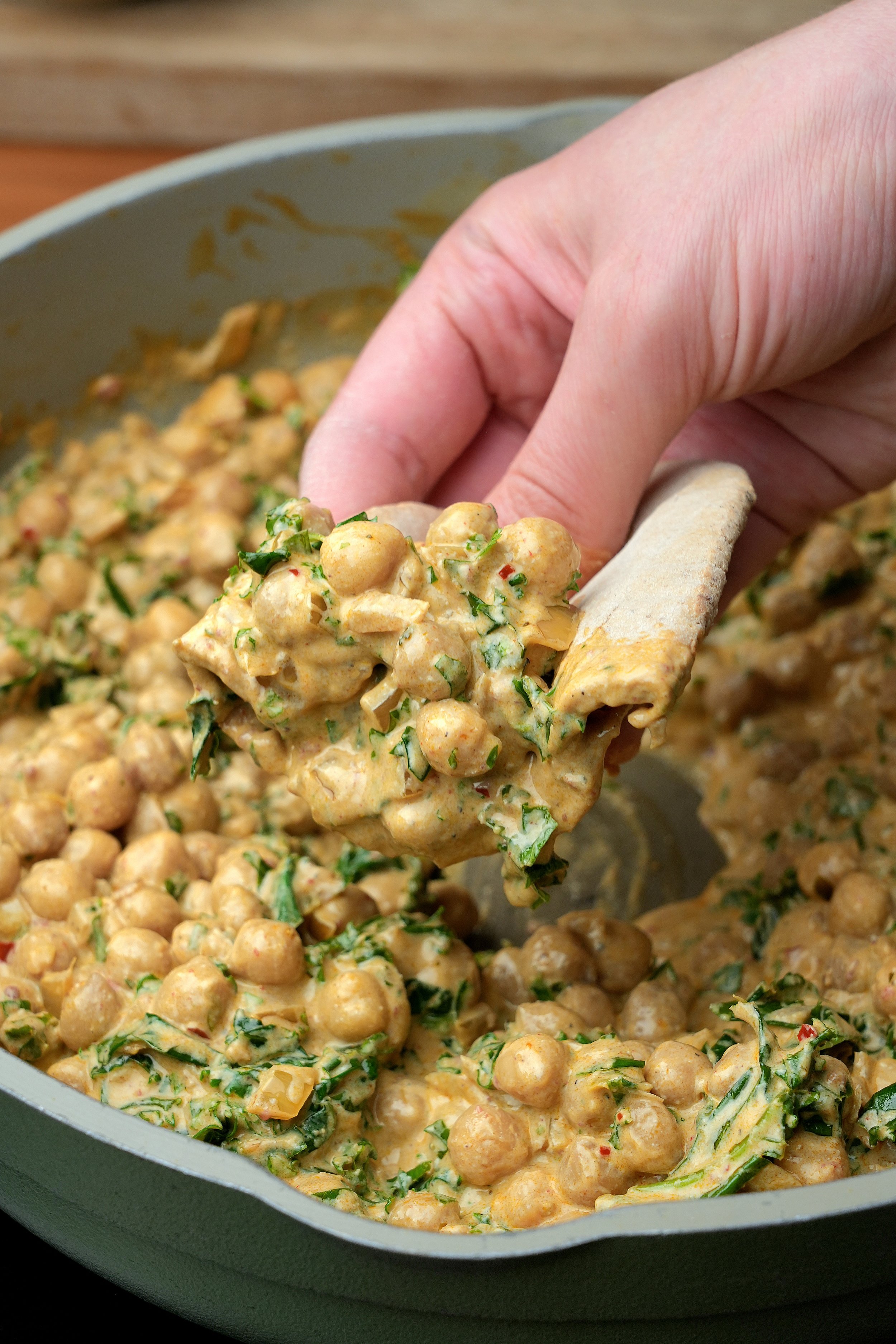 creamy high protein vegan harissa and kale batch cook creamy chickpeas meal prep friendly gluten free image with pitta bread