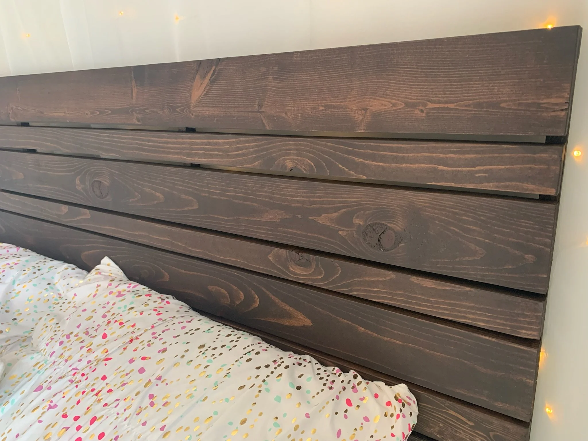 the "Adonis" headboard in coffee