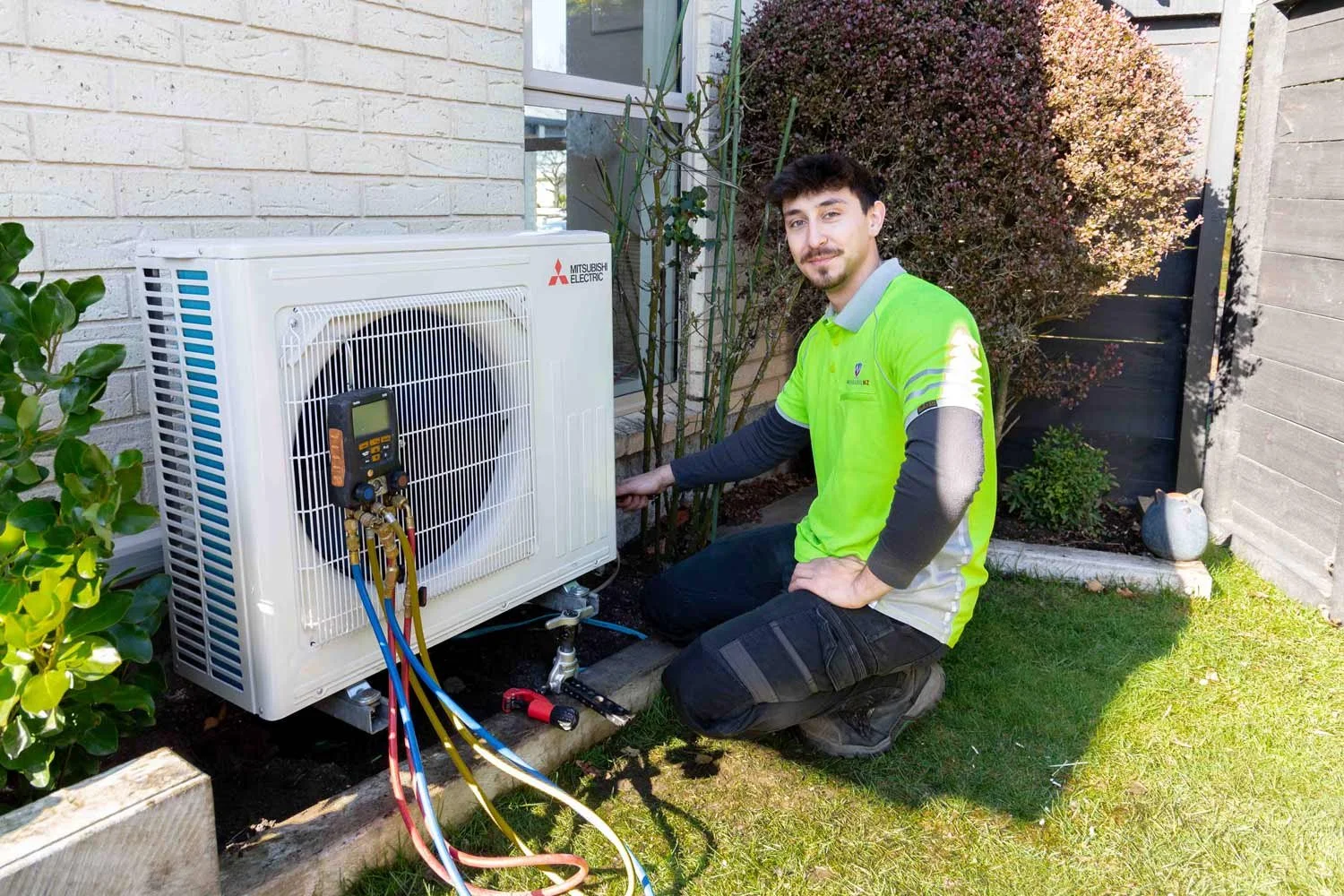 modserve technician installing a mitsubishi electric heat pump