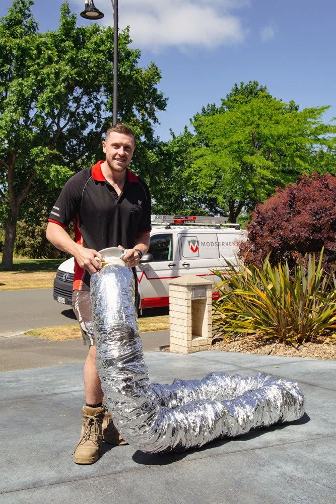 modserve technician installing home ventilation system