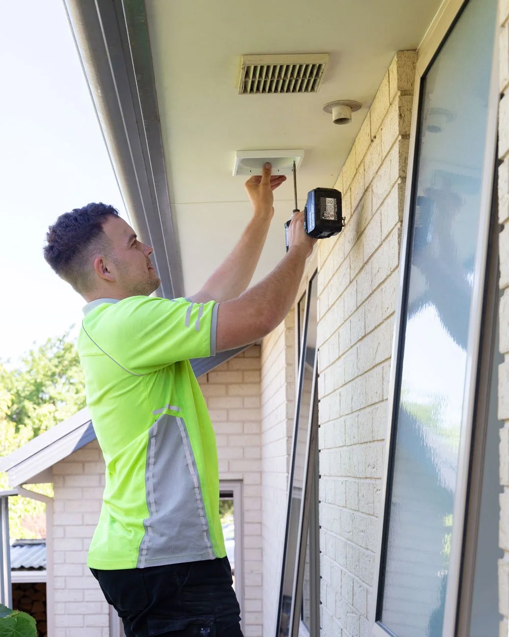 modserve christchurch electrician installing home ventilation exterior fixing