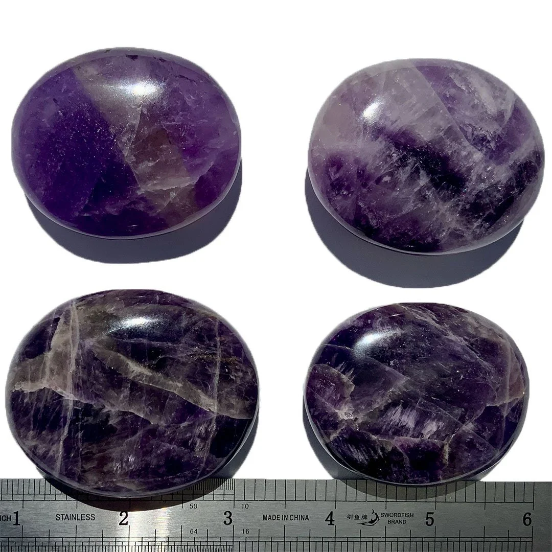 Amethyst, palm stones with ruler.jpg