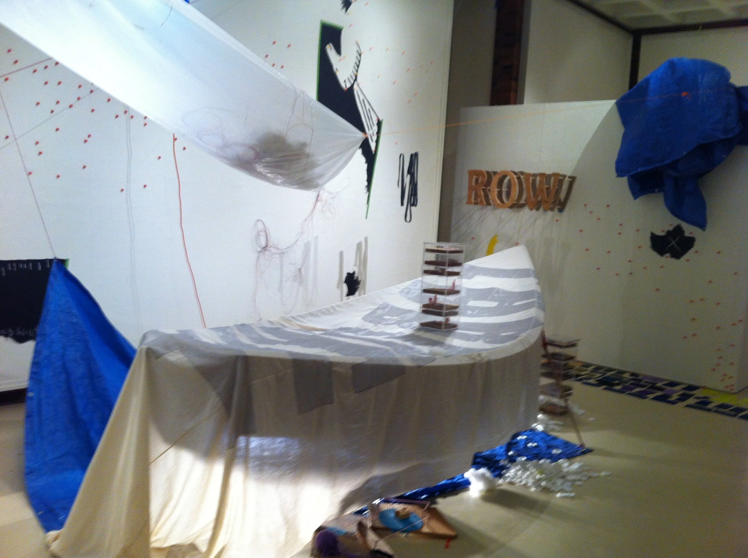 Farewell; Good Mourning, 15 feet x 30 feet x 15 feet, boat, fabric, wood and other mixed media. Audio recording of everyone I knew who would leave me a voicemail of them whispering "row, row, row, your boat" Click image for sound. 