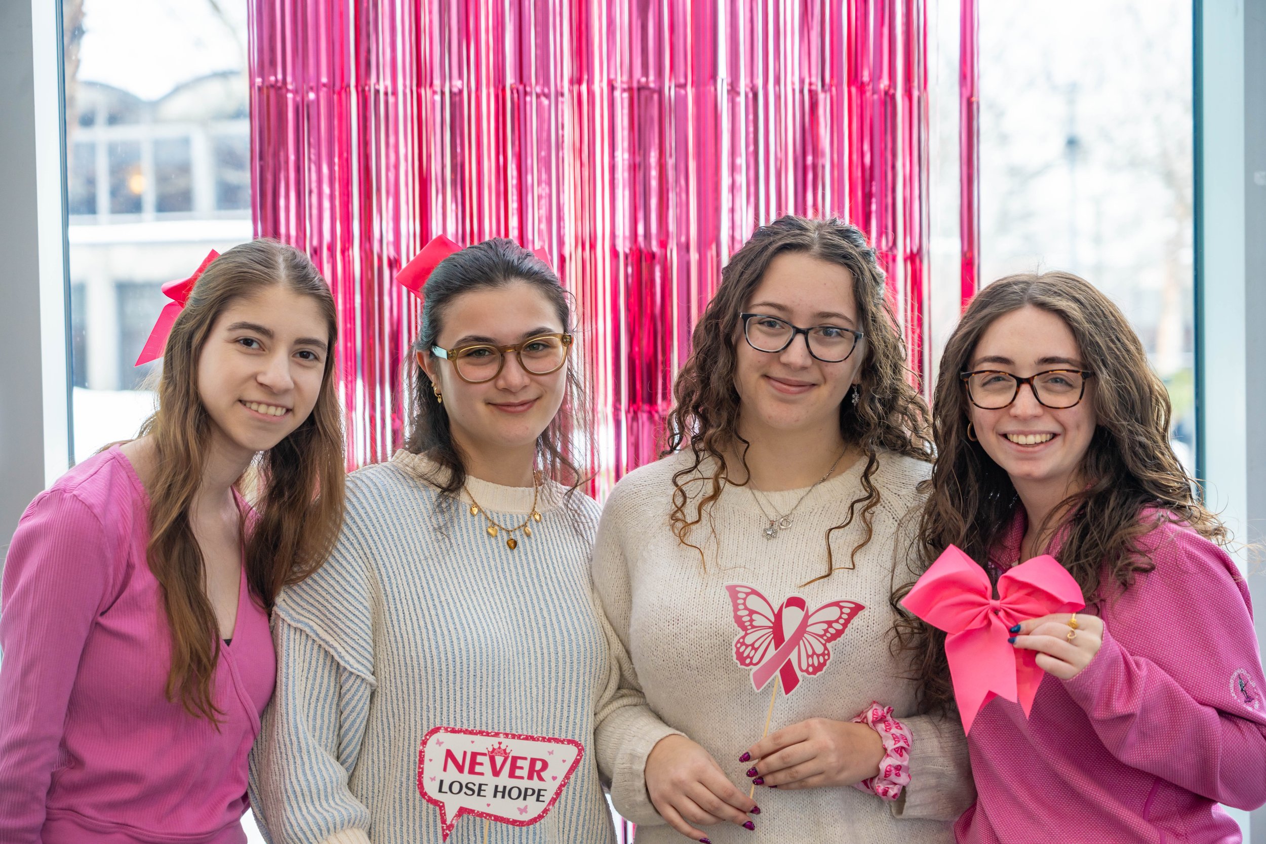 Students posing at Sharsheret Pink Day 2026