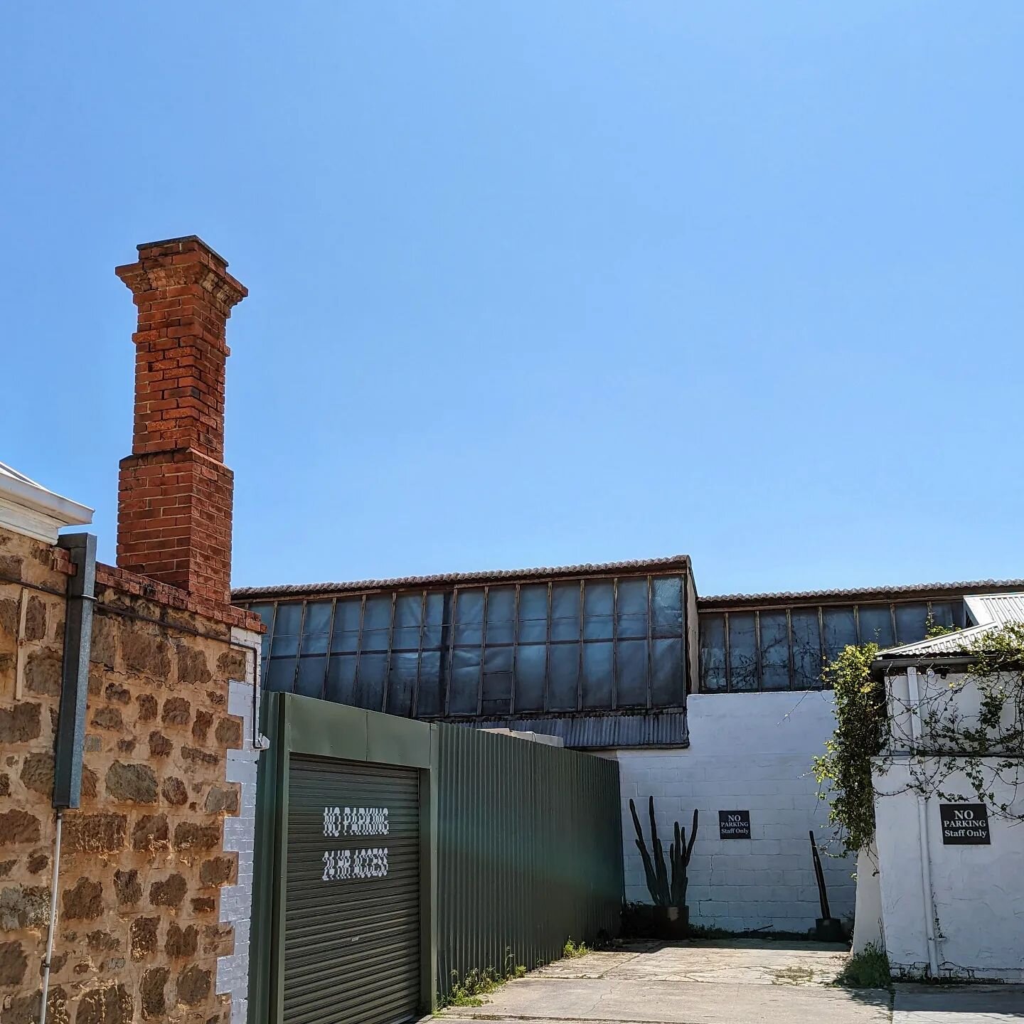 Saw tooth roofs, brick chimney, #unley #sawtoothroof