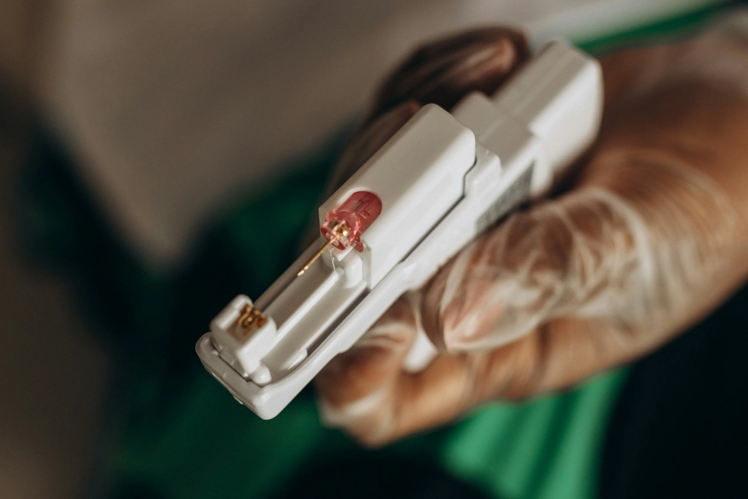 Needle vs. Piercing Gun