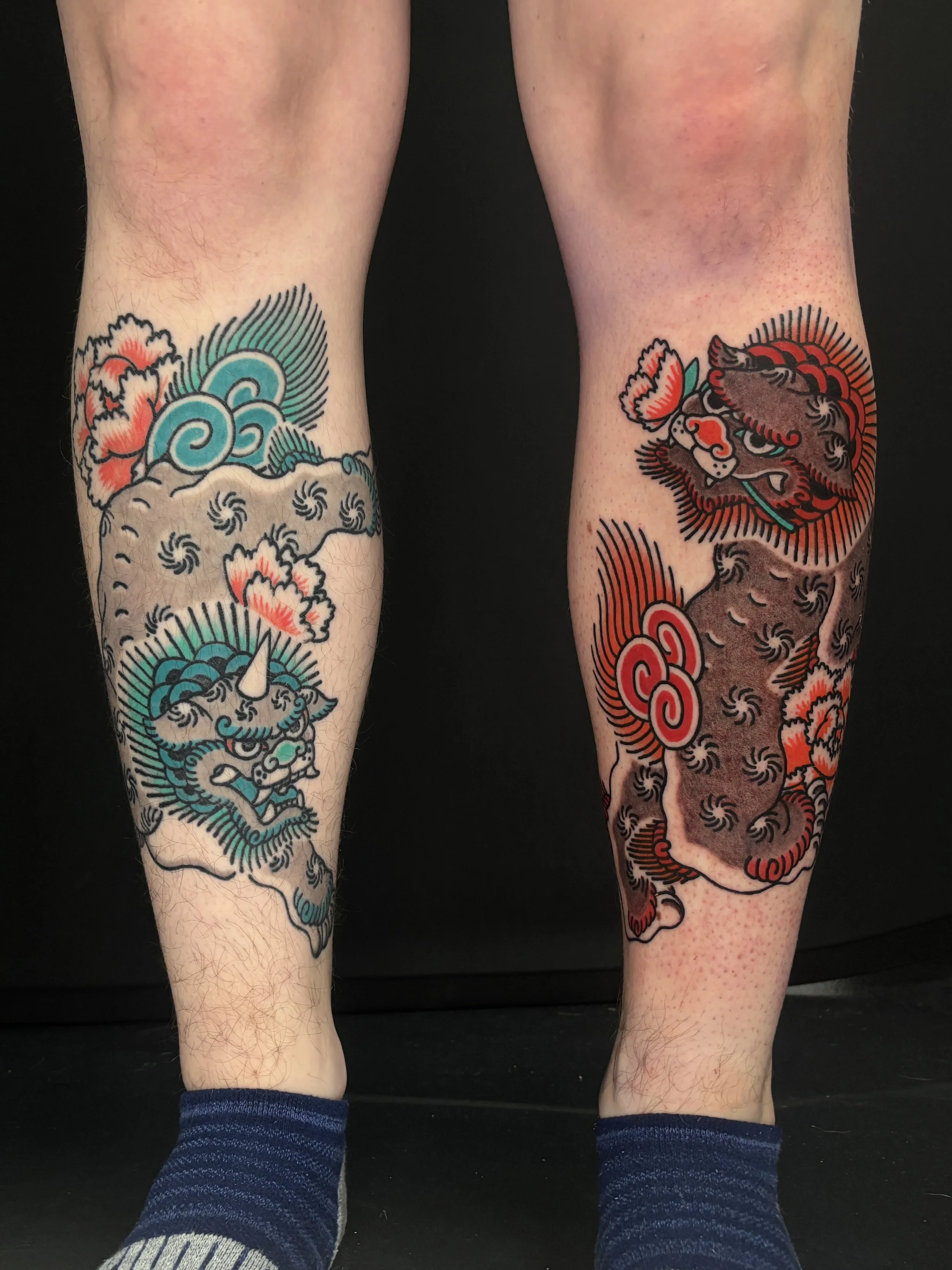 pair of foodog shishi japanese tradtional leg tattoo