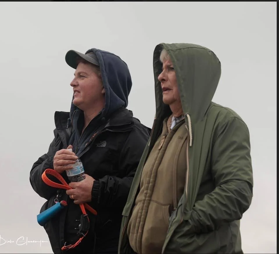 Betsy Reiney and Allison discussing the blind drill Pat has in store.