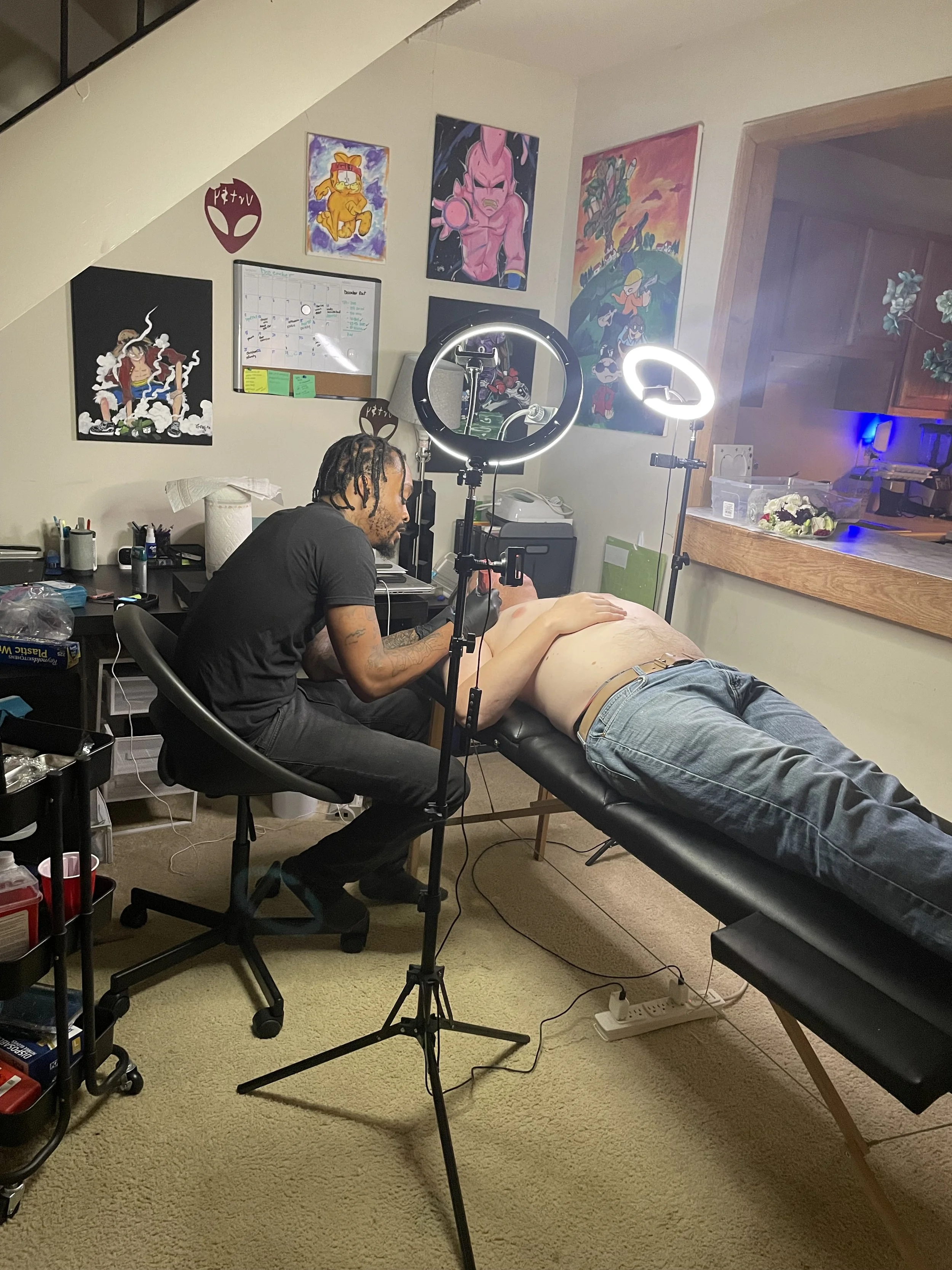 Professional Tattoo artist Vrt during In home Tattoo sessions