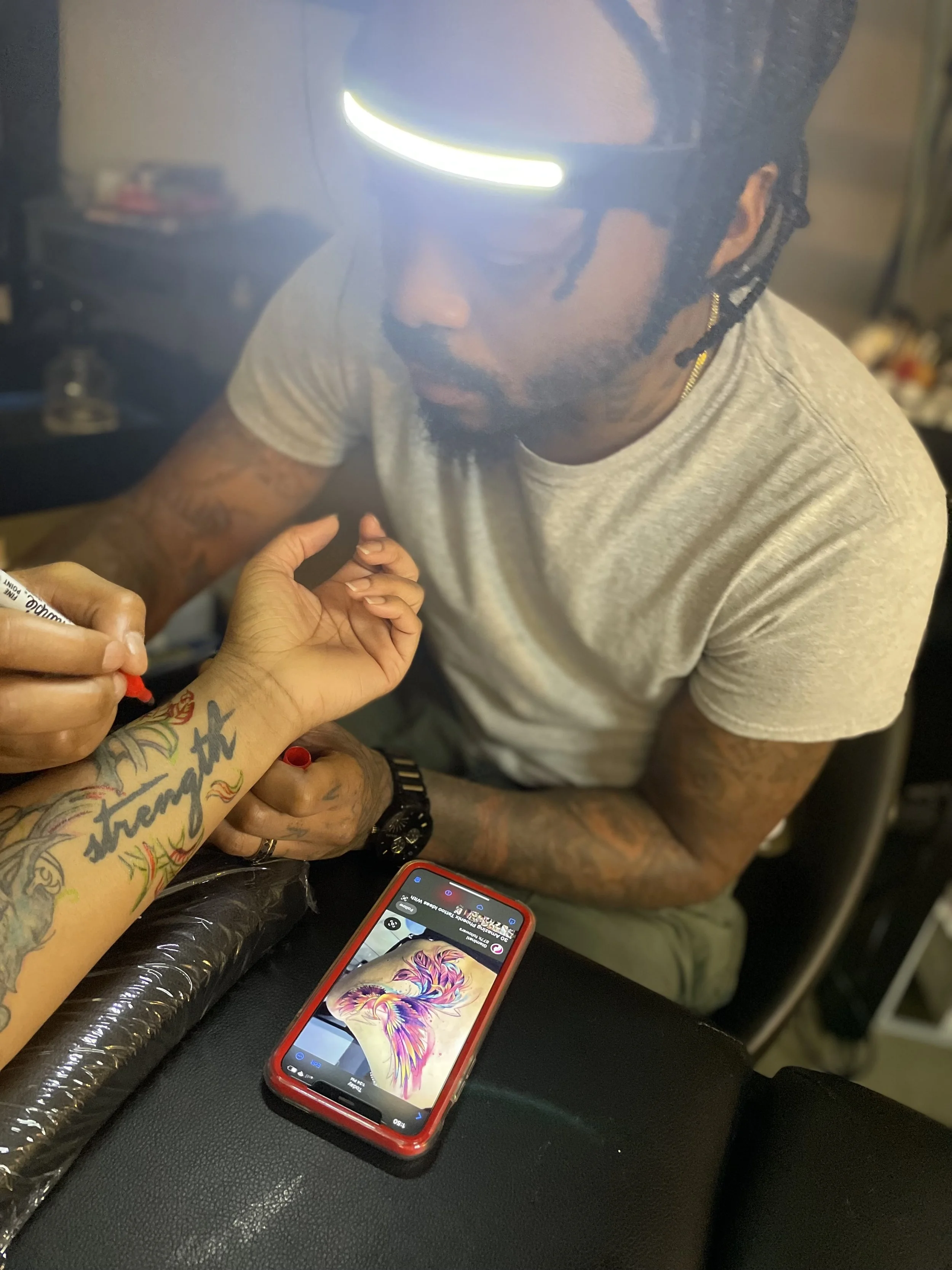 Professional Tattoo Artist Vrt Hand drawing Phoenix Tattoo from client inspiration