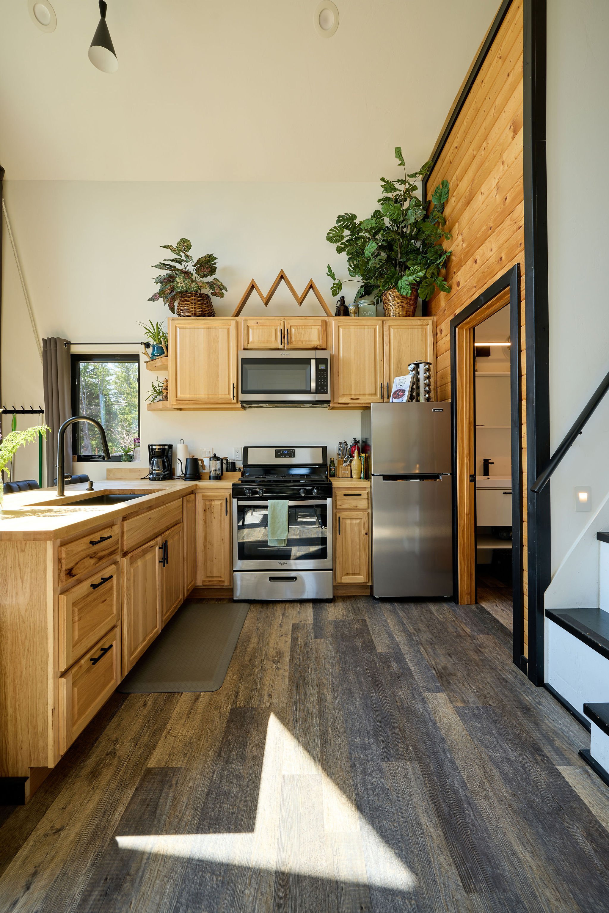Fully stocked kitchen with full sized fridge