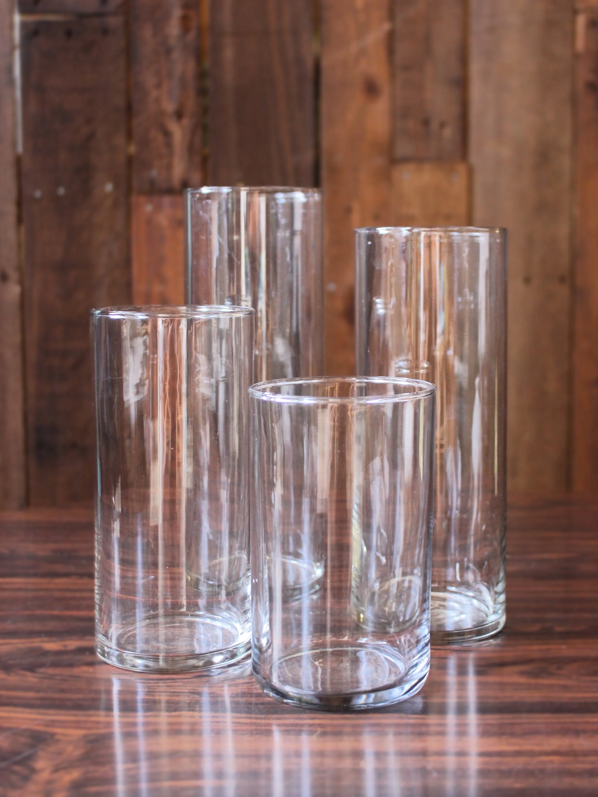 Glass Cylinder Hurricane Candleholders: 6-7.5" 50+ count, 9-10.5"  20+ count, 14-18" 5 count 