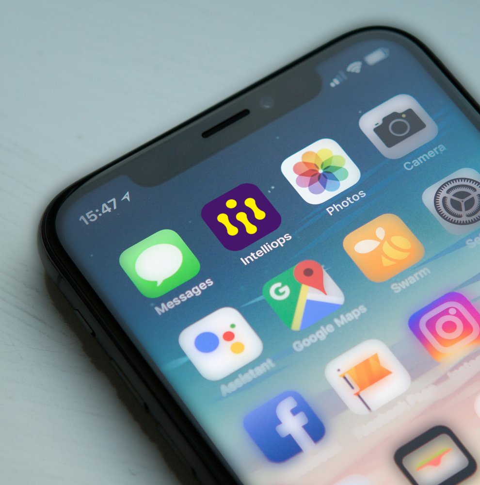 IntelliOps mobile app icon displayed on smartphone home screen for AI HVAC platform