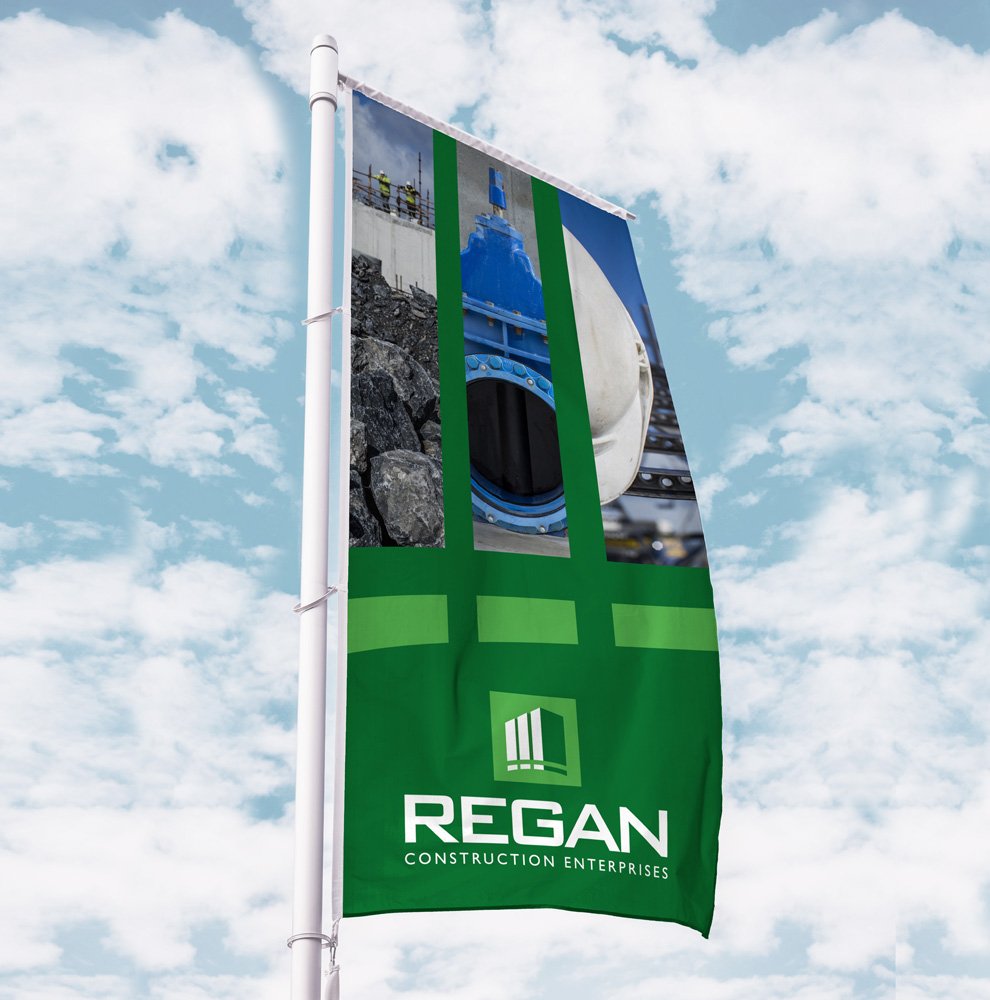 Regan Construction flag design displaying logo and brand colours