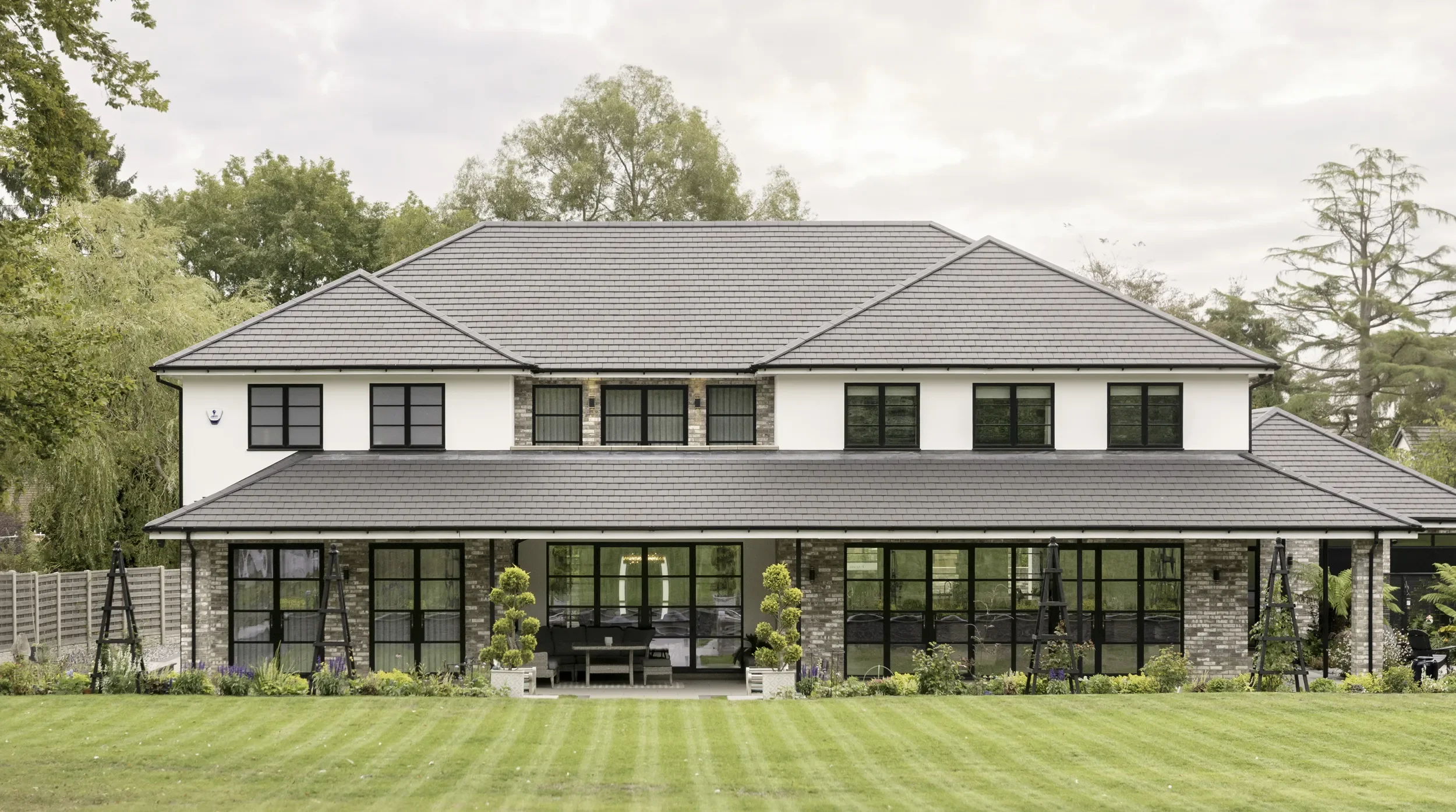 Garden elevation with a wraparound covered terrace
