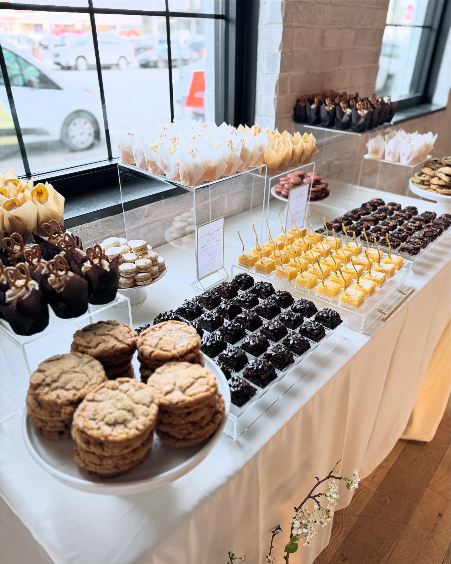 The most tempting table of desserts, packed full of my personal favorites like peanut butter cookies, lemon bars, banana browned butter cupcakes and slutty brownies. Chloe &amp; Trevor knocked it out of the park with this one!