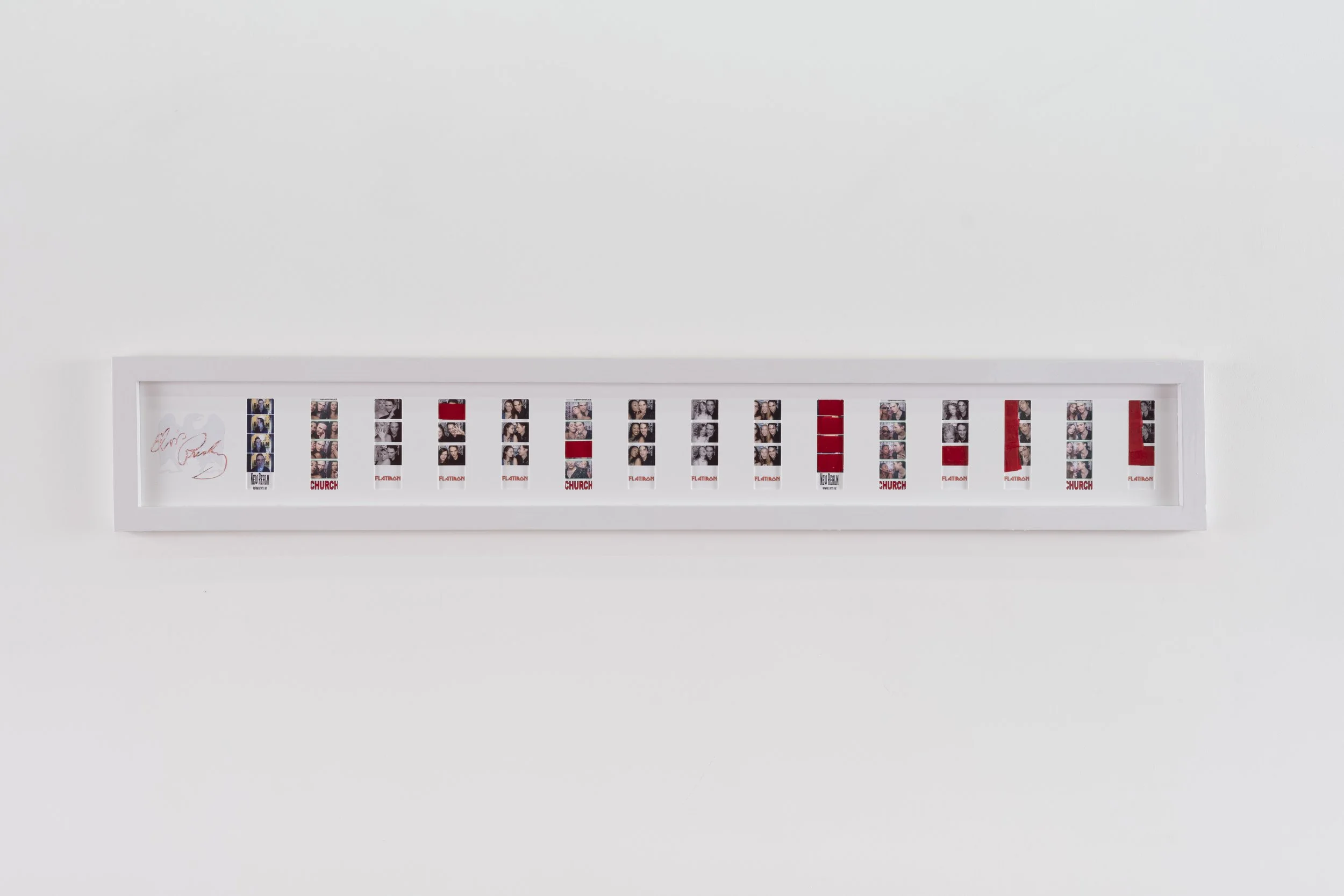 A framed collage with multiple photo strips and red accents, mounted on a white wall.