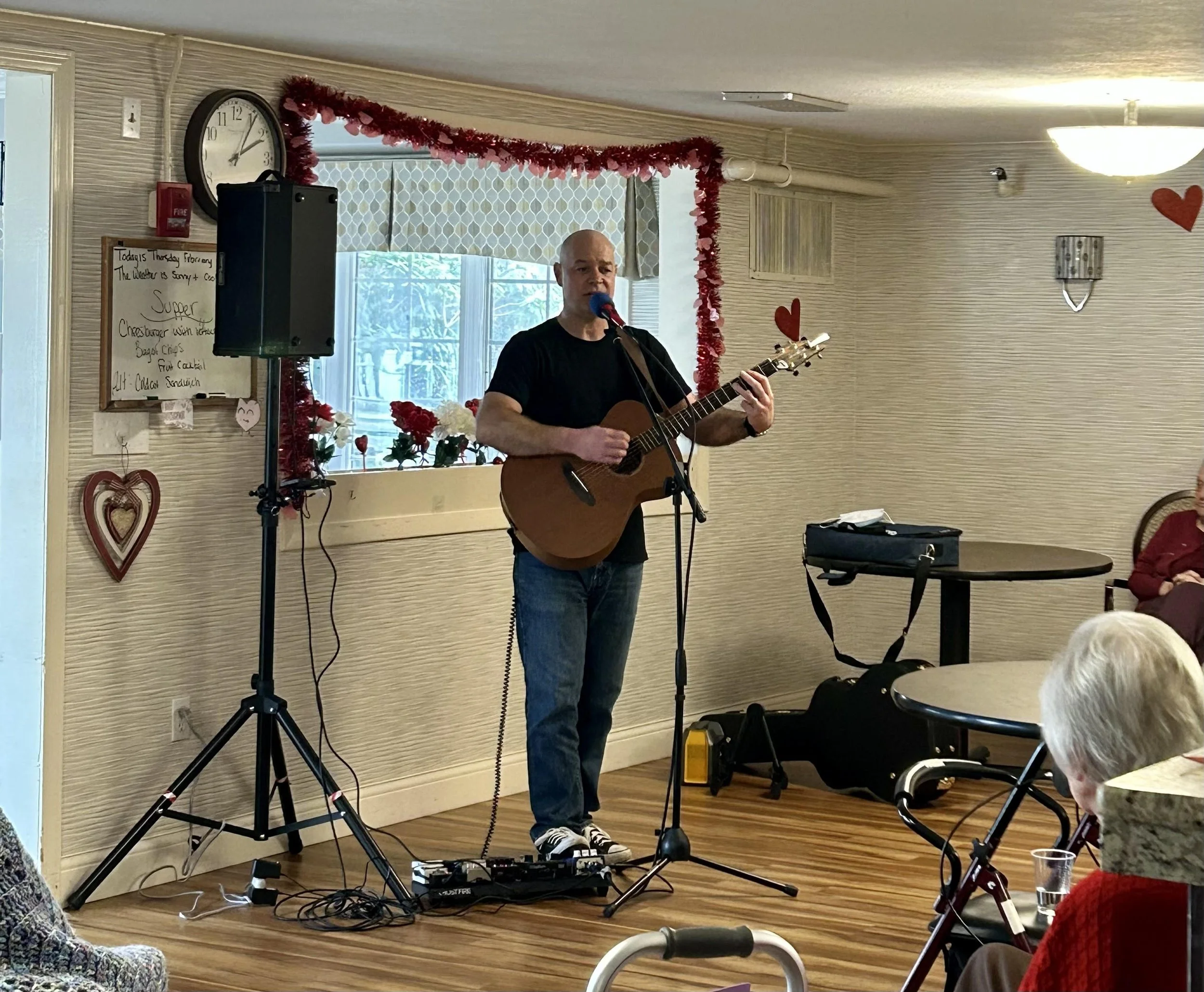 Adam performs for residents