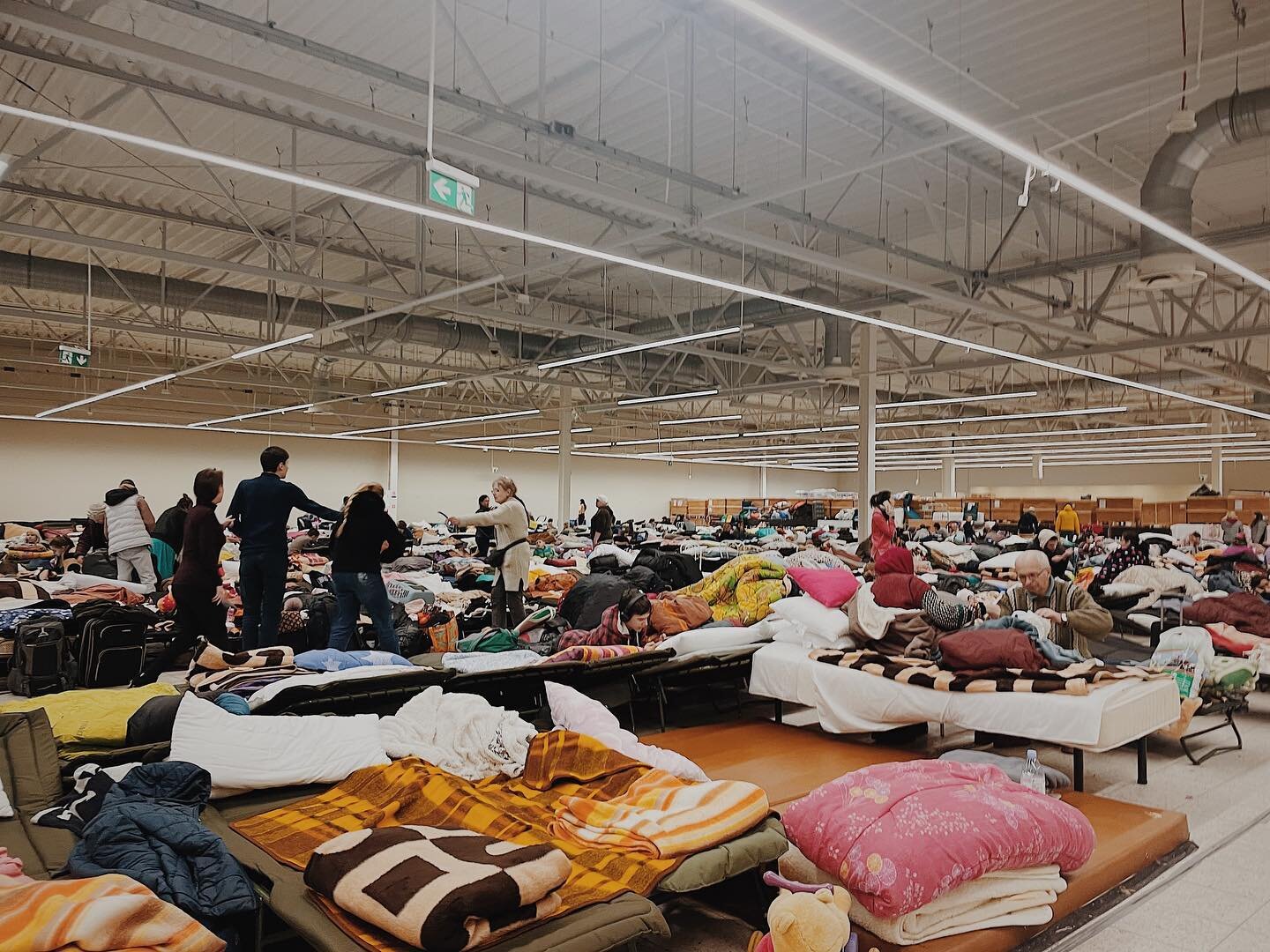 Scenes from inside a Ukrainian Refugee Center. 

After crossing the border, those who have fled Ukraine get something warm to drink, food to eat, and even immediate medical attention if needed. 

From there those who have an expecting ride coming for