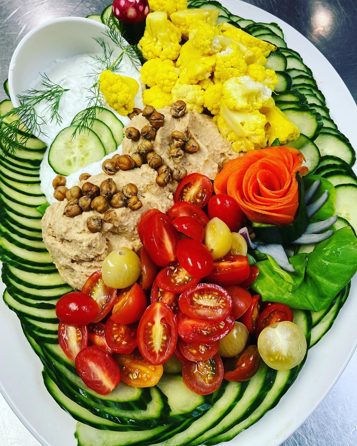 Be the office rockstar and pick up a couple of platters from #noa! 

Our hummus and veggie board is perfect for a light snack, with house-made hummus and tzatziki and fresh cut veggies! 

You also can&rsquo;t go wrong with an antipasti platter! Mount