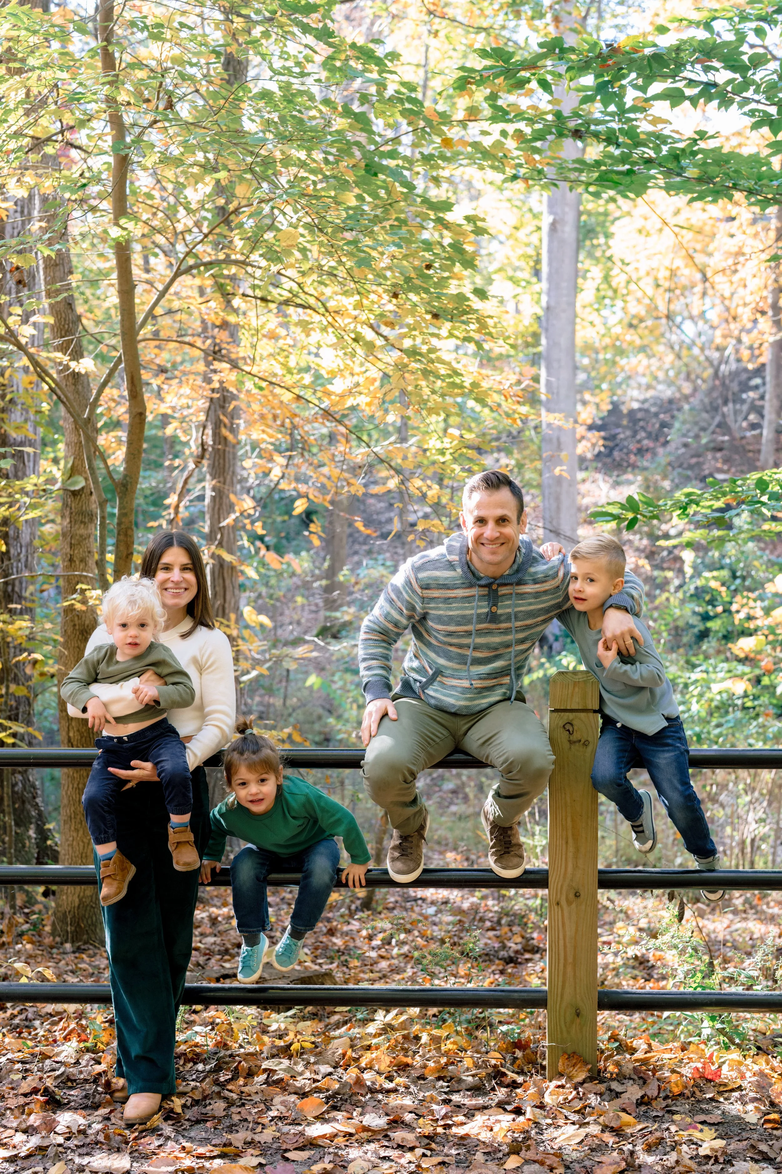 Three Young Campesi Boys sitting on a front stoop