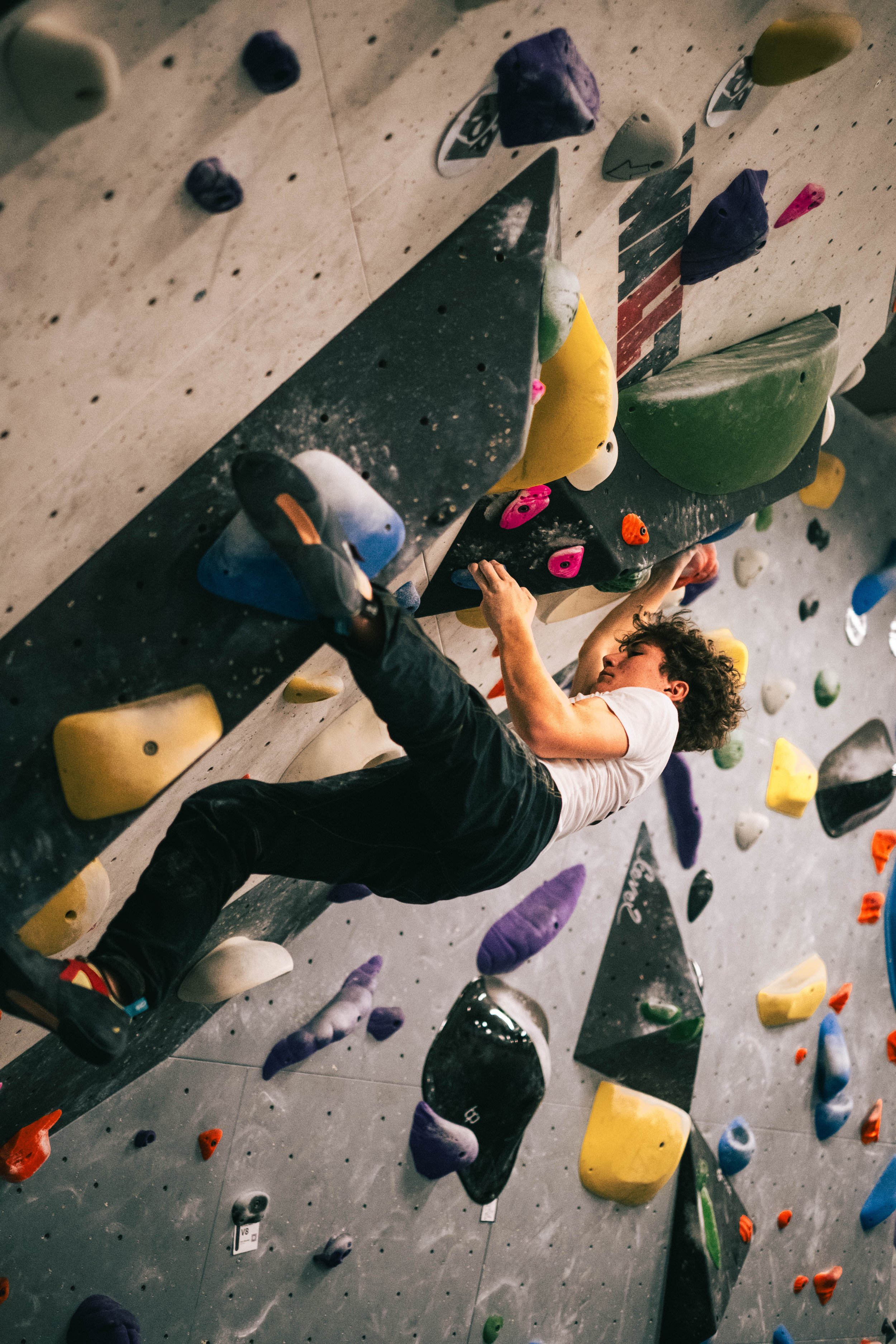 Boy rock climbing on a wall