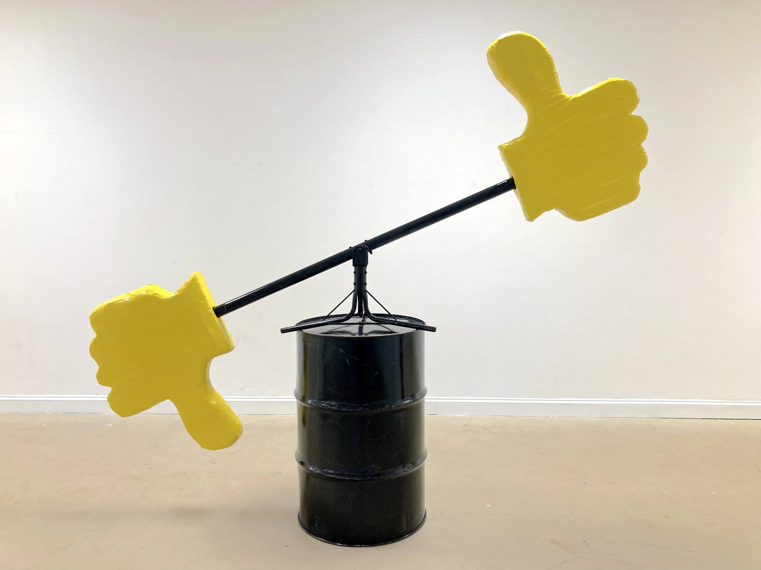 On Balance (2025) repurposed children's seesaw, upholstery foam, duct tape, steel drum
