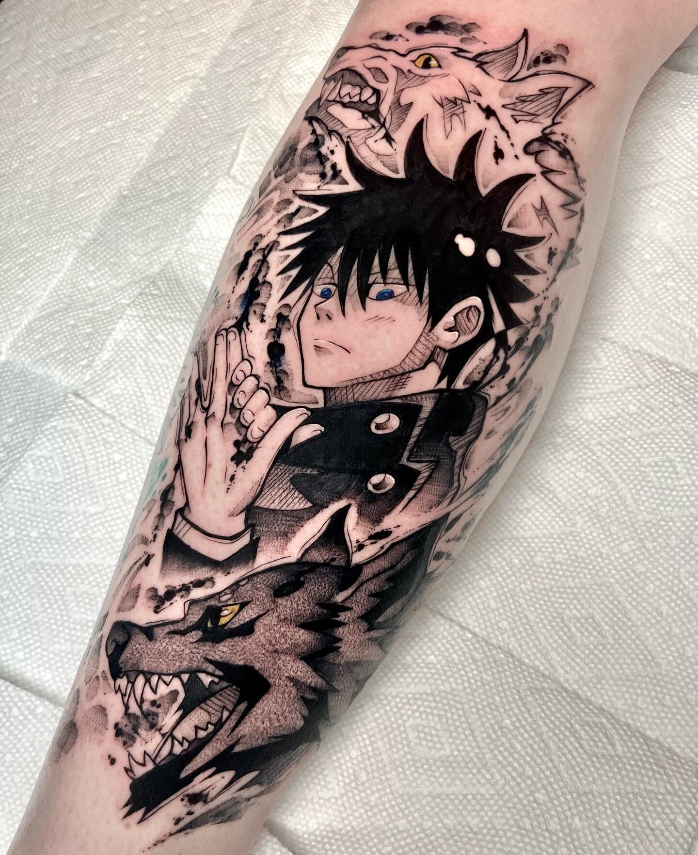 Megumi Fushiguro of JJK and his divine dogs has gotta be my favorite character from this show. We started tying this one into an older Sukuna/Gojo tattoo which is the most satisfying feeling! Thank you again @emilylaitola for sitting like an absolute