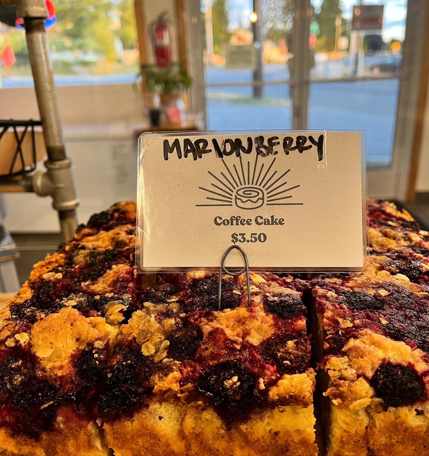 This morning is looking as beautiful as this coffee cake! We have two today featuring Marionberries from one of our regulars! #buenaluz #bakery #portangeles