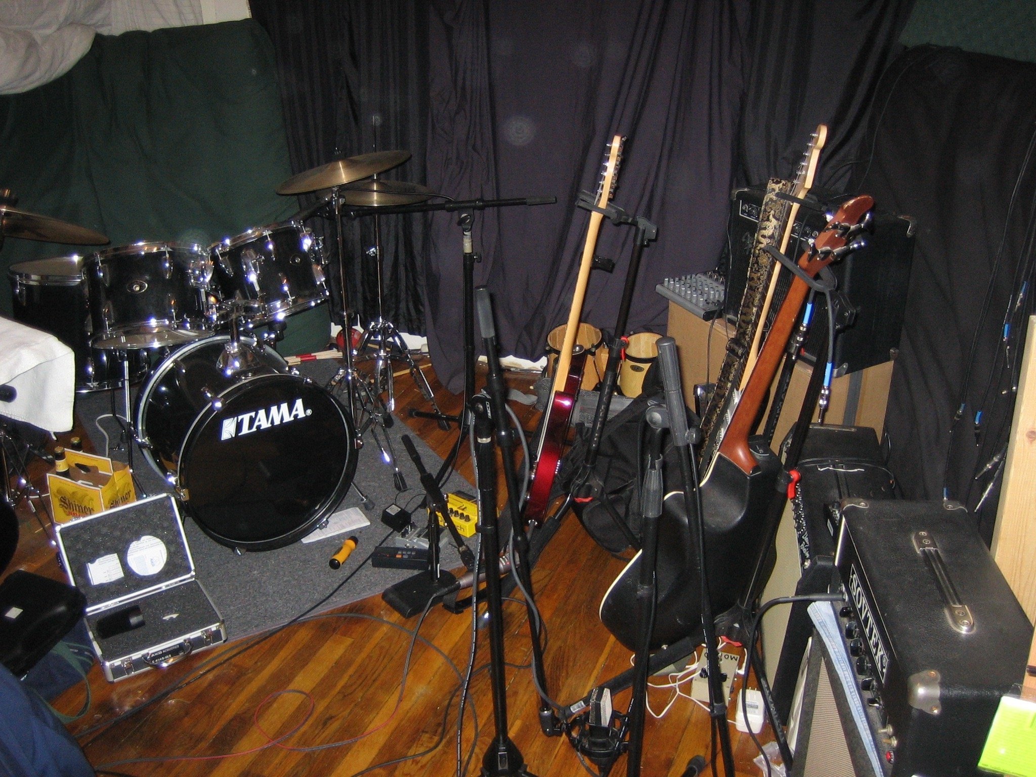 Interior of a recording studio crowded with instruments