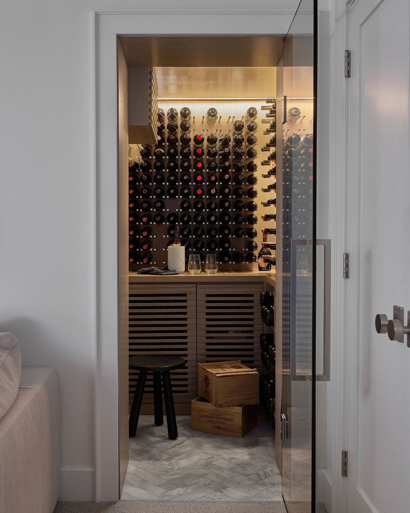 Curious how we transformed a small storage closet into a wine room?  Read below and swipe to see the before and full transformation.⁠
⁠
After we completed the Beaches Residence full home renovation, the clients reached back out to our team when they 