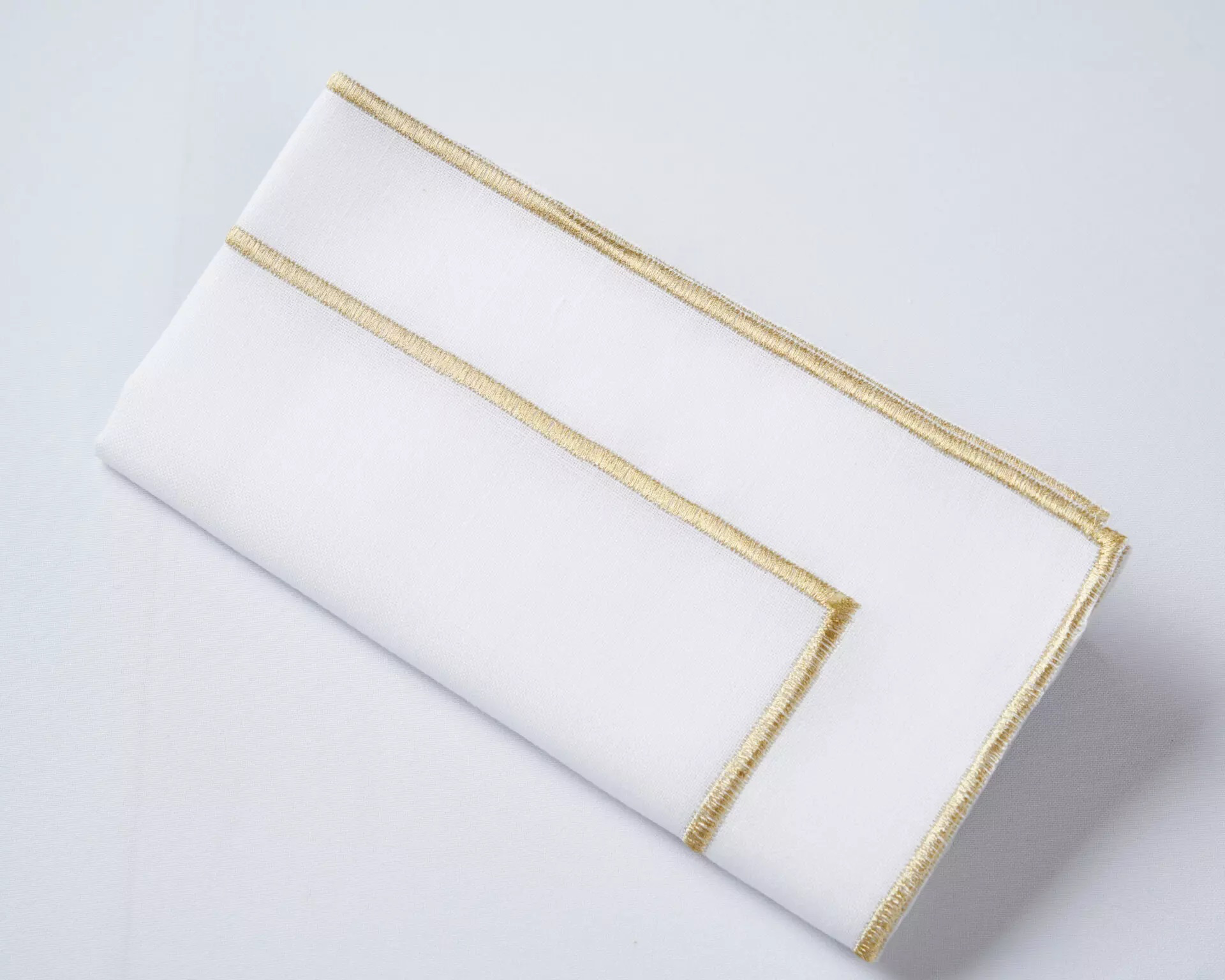 White & Gold Stitch - $3.75