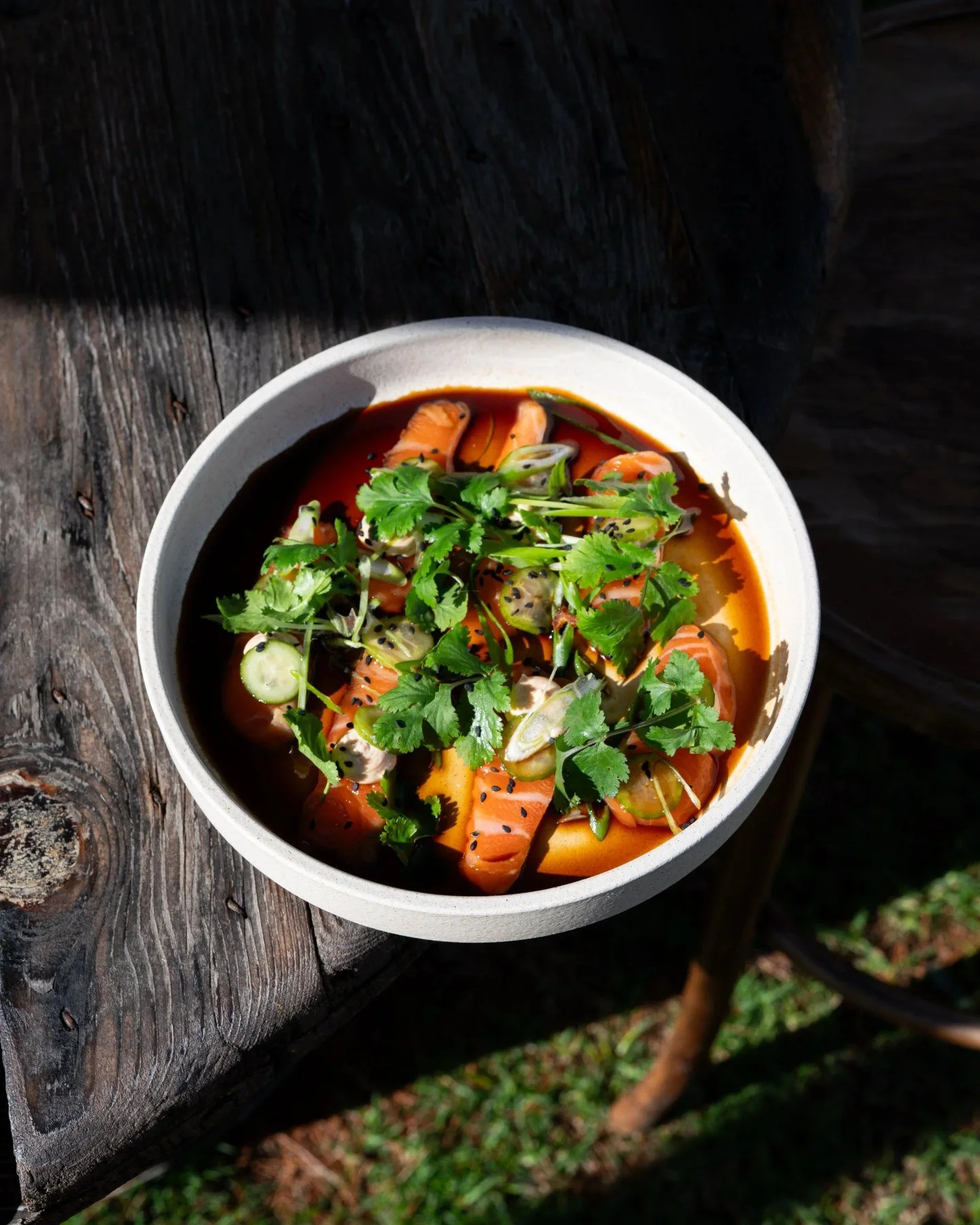 Braised dish topped with fresh herbs