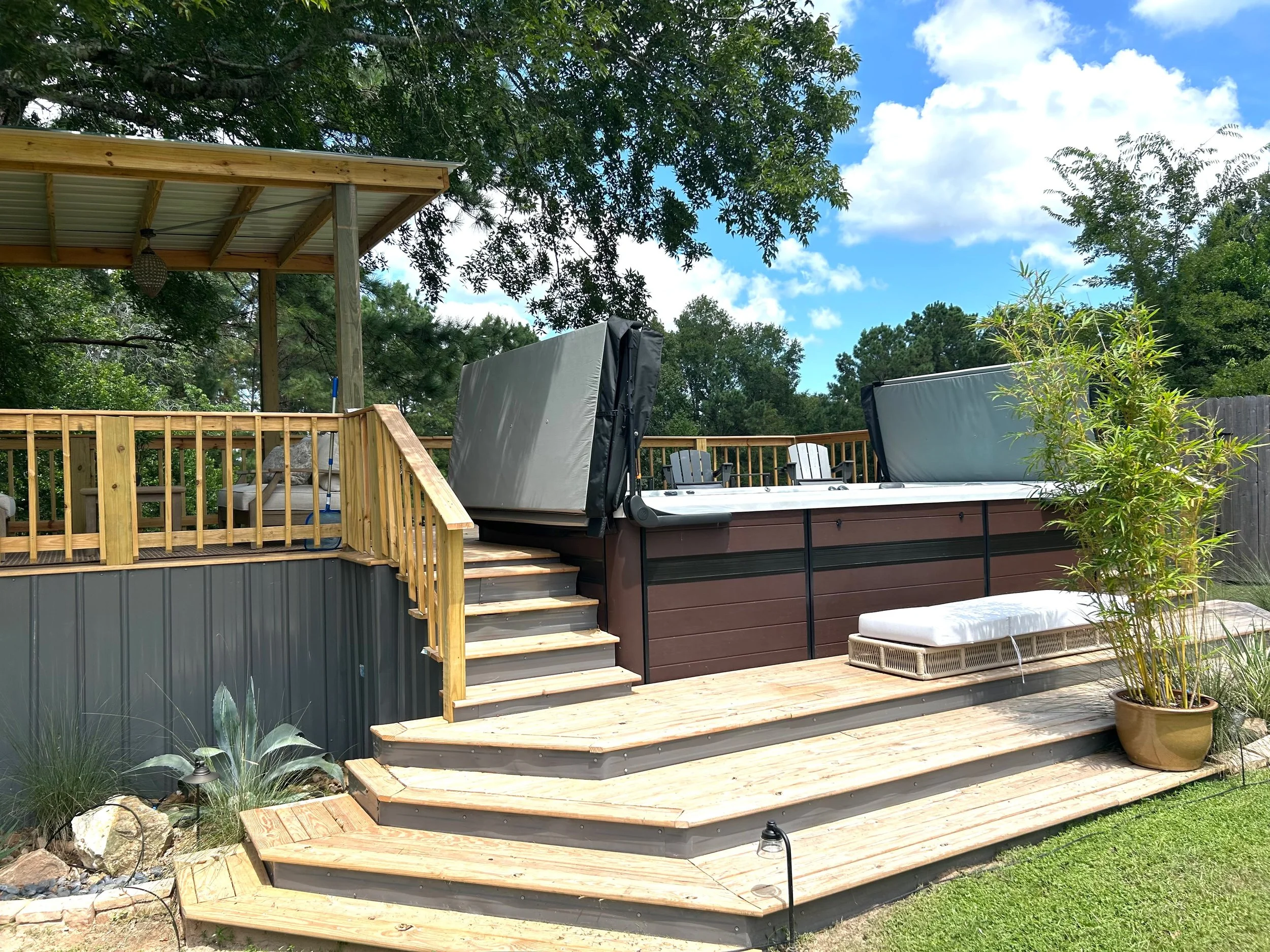 Outdoor hot tub and patio deck at Golden Hill Retreat Center