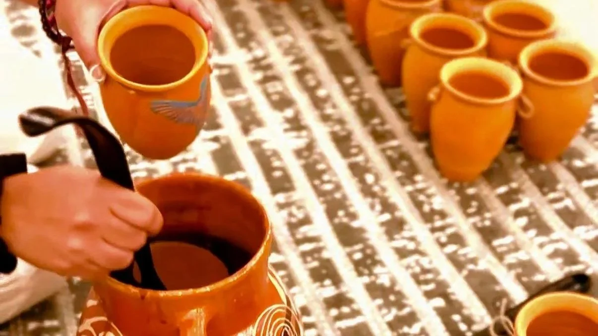 Cacao being poured for the opening ceremony