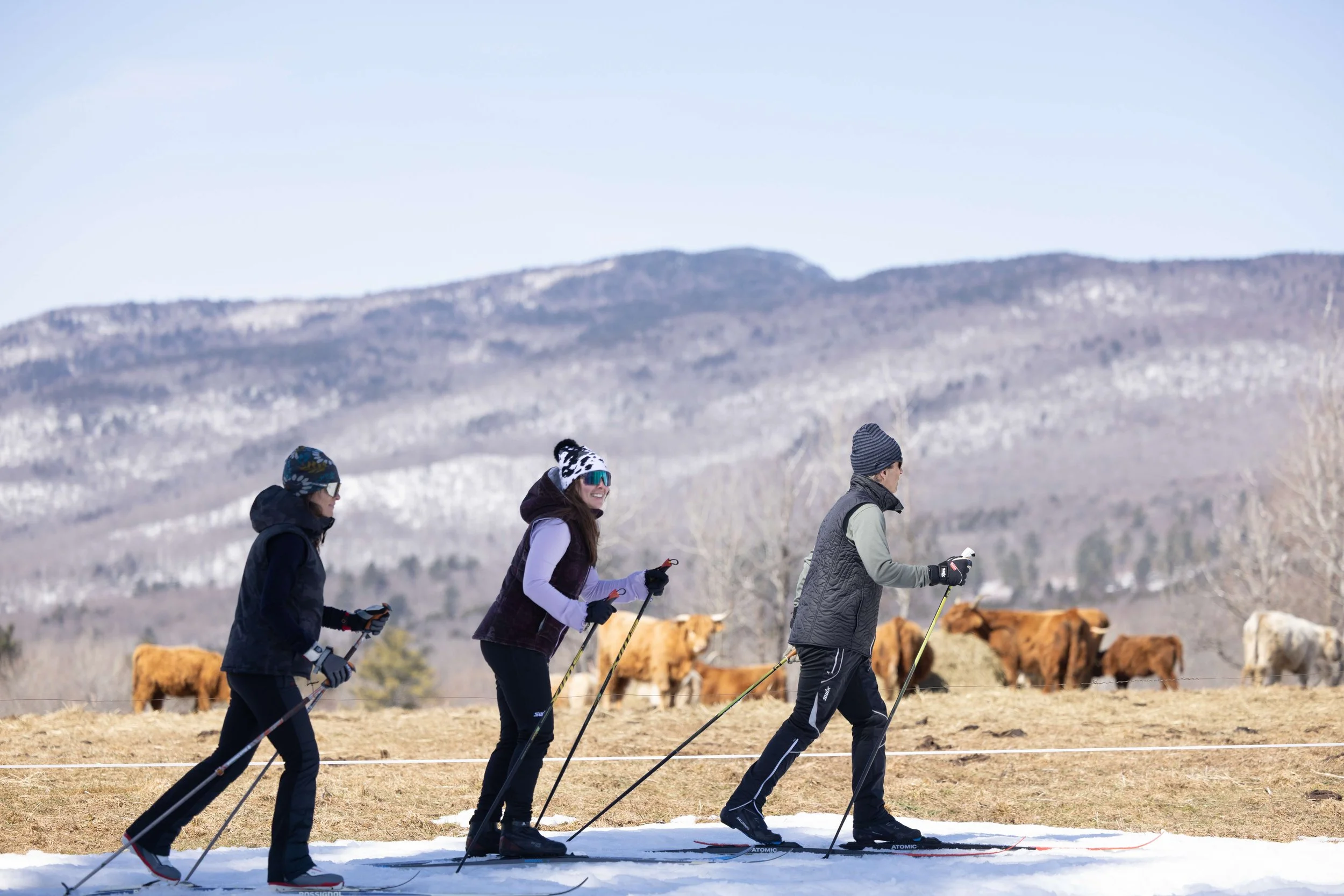 3 cross country skiers in stowe wearing fourbital factory beanies